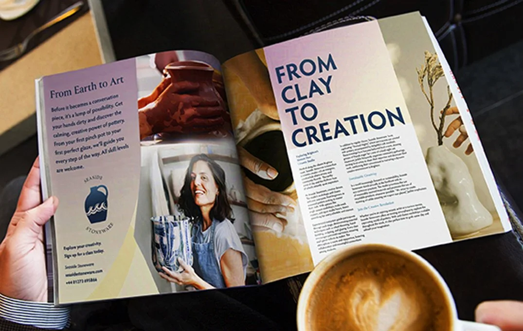 Open magazine page featuring pottery workshop advertisement with text 'From Earth to Art' and a woman holding a pottery piece.