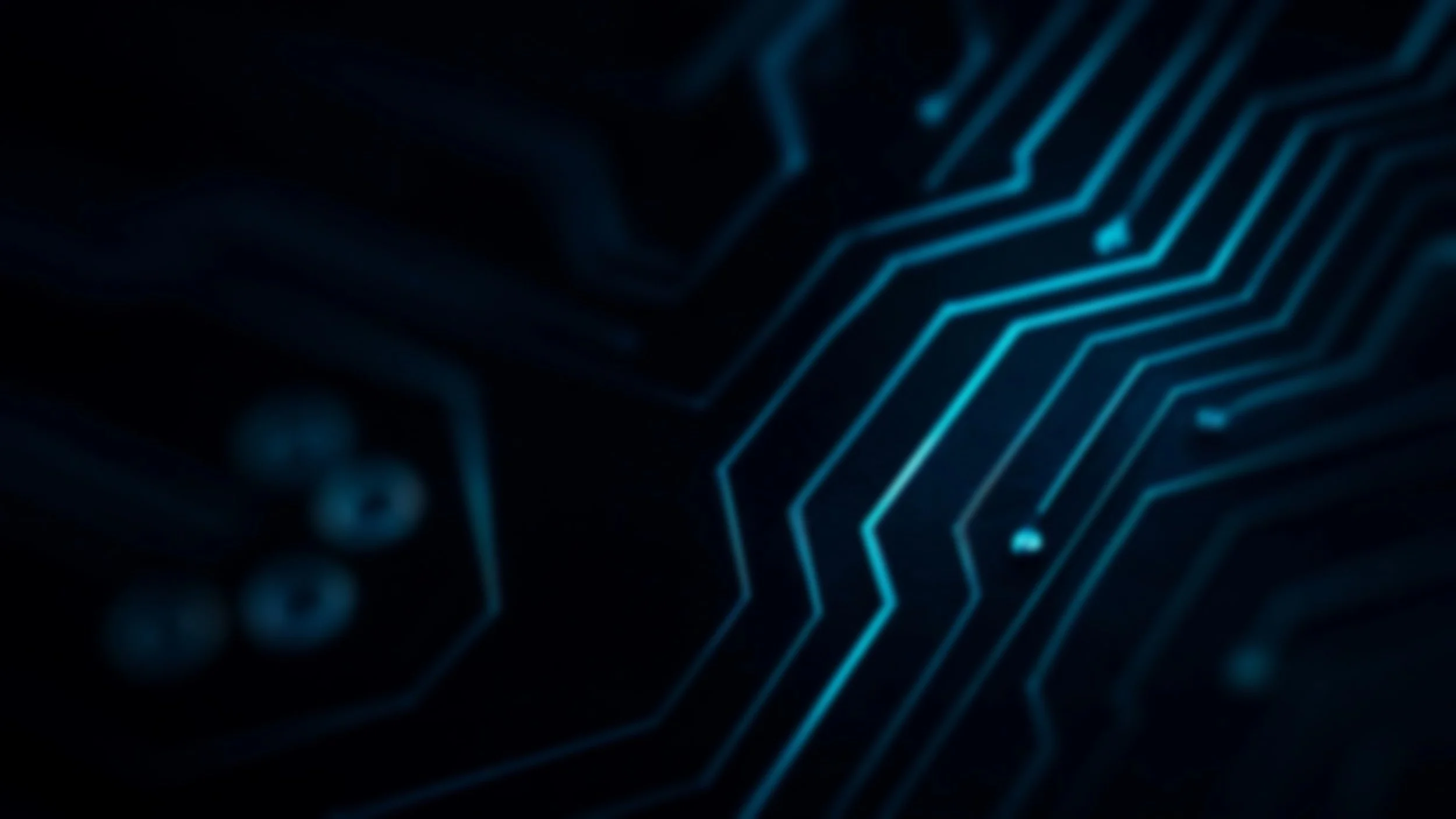 Close-up image of a dark circuit board with glowing blue lines and connections, highlighting electronic pathways and components in a futuristic, high-tech style.