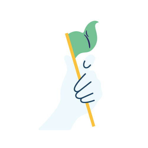 A white hand holding a paintbrush with green paint on the tip.