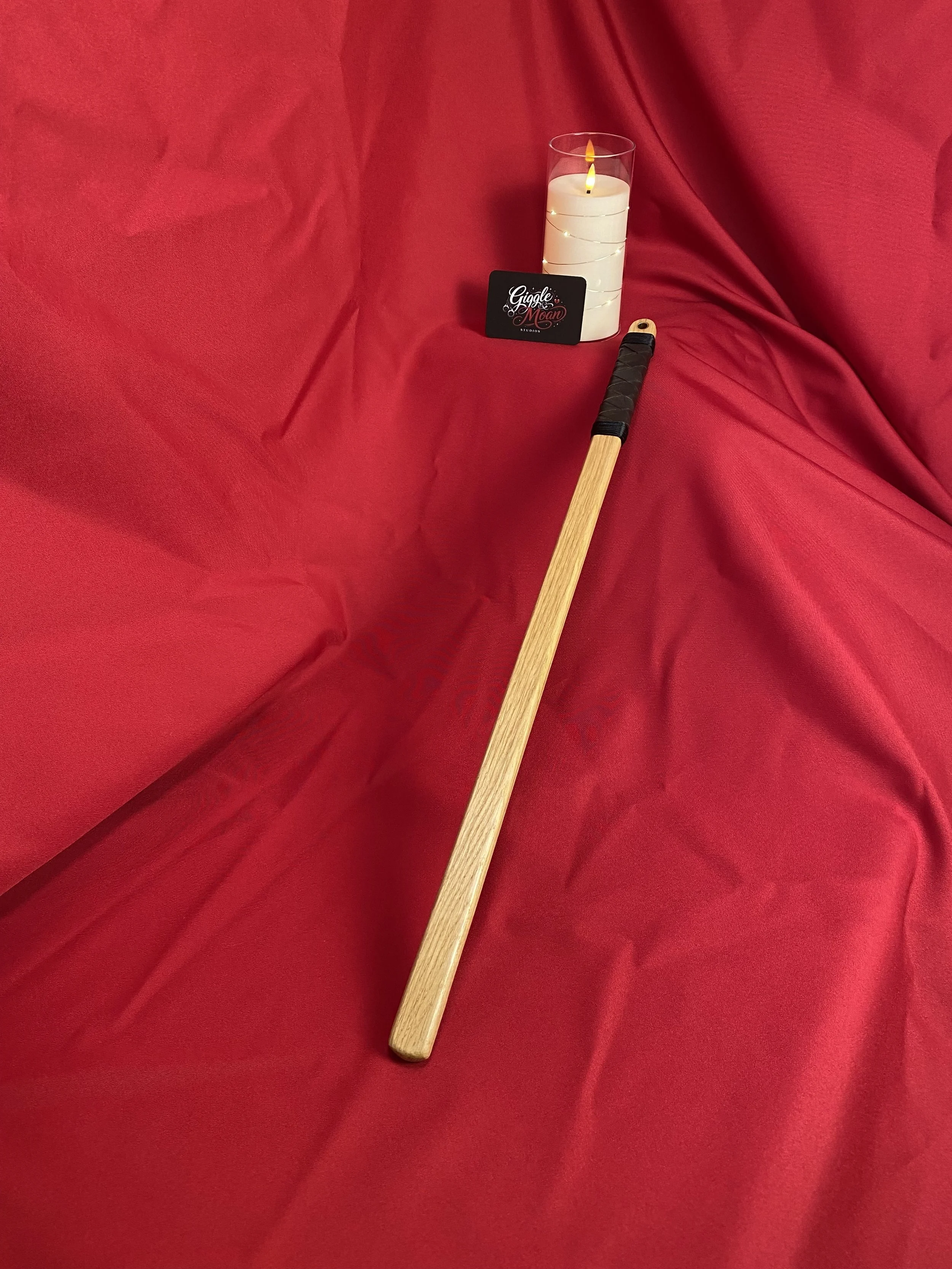 Pencil style paddle with leather grip