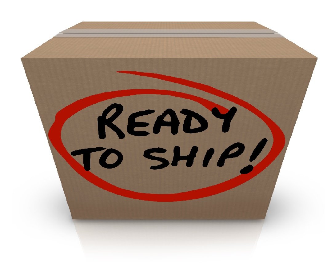 A cardboard box with a red handwritten message that reads, "Ready to ship!"