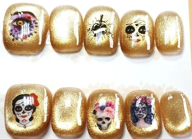TMS-2254L  Golden Cat Eye with Skulls Nail Set