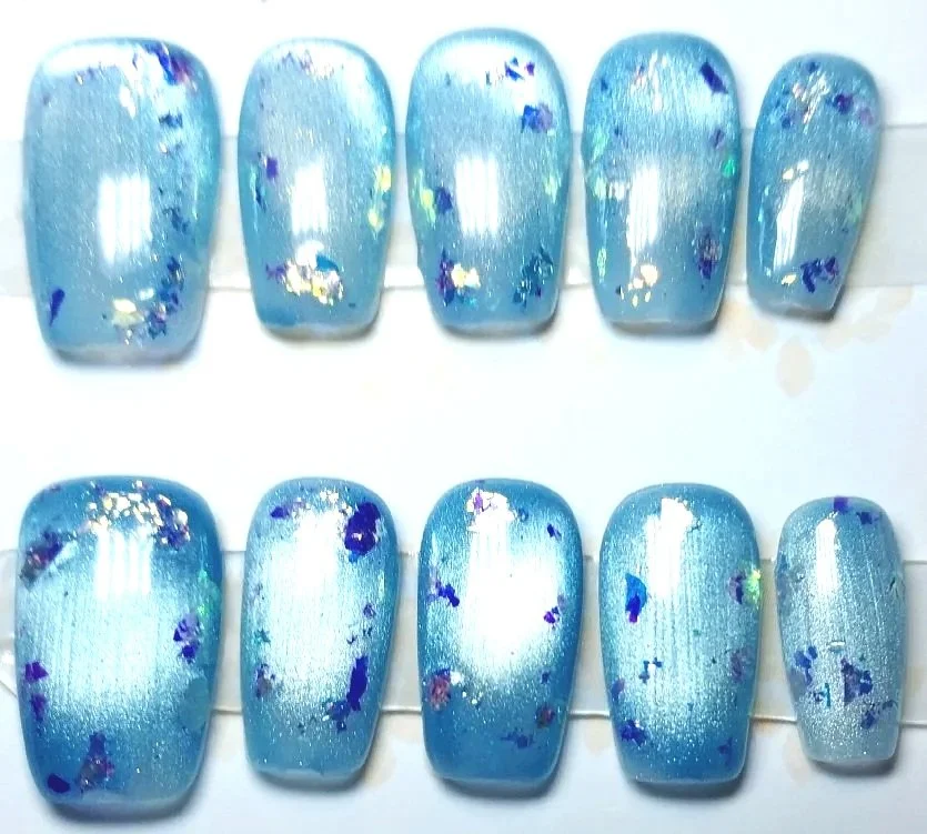 CC-775S  Light Blue cat Eye with large glitter