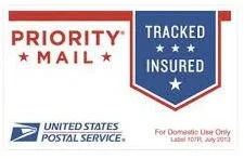 Priority Mail sticky label from the United States Postal Service, tracked and insured, for domestic use only, dated July 2013.