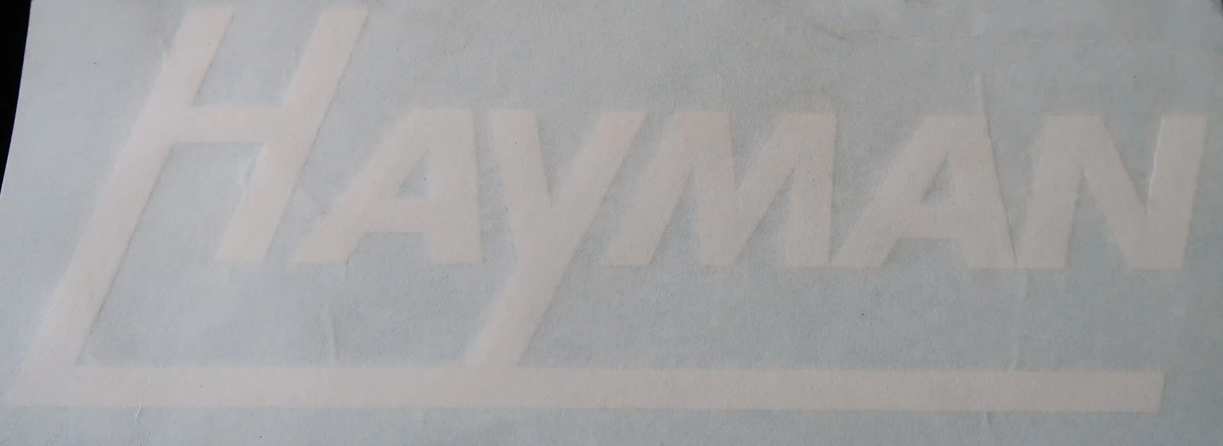 Hayman Bass Drum logo - white