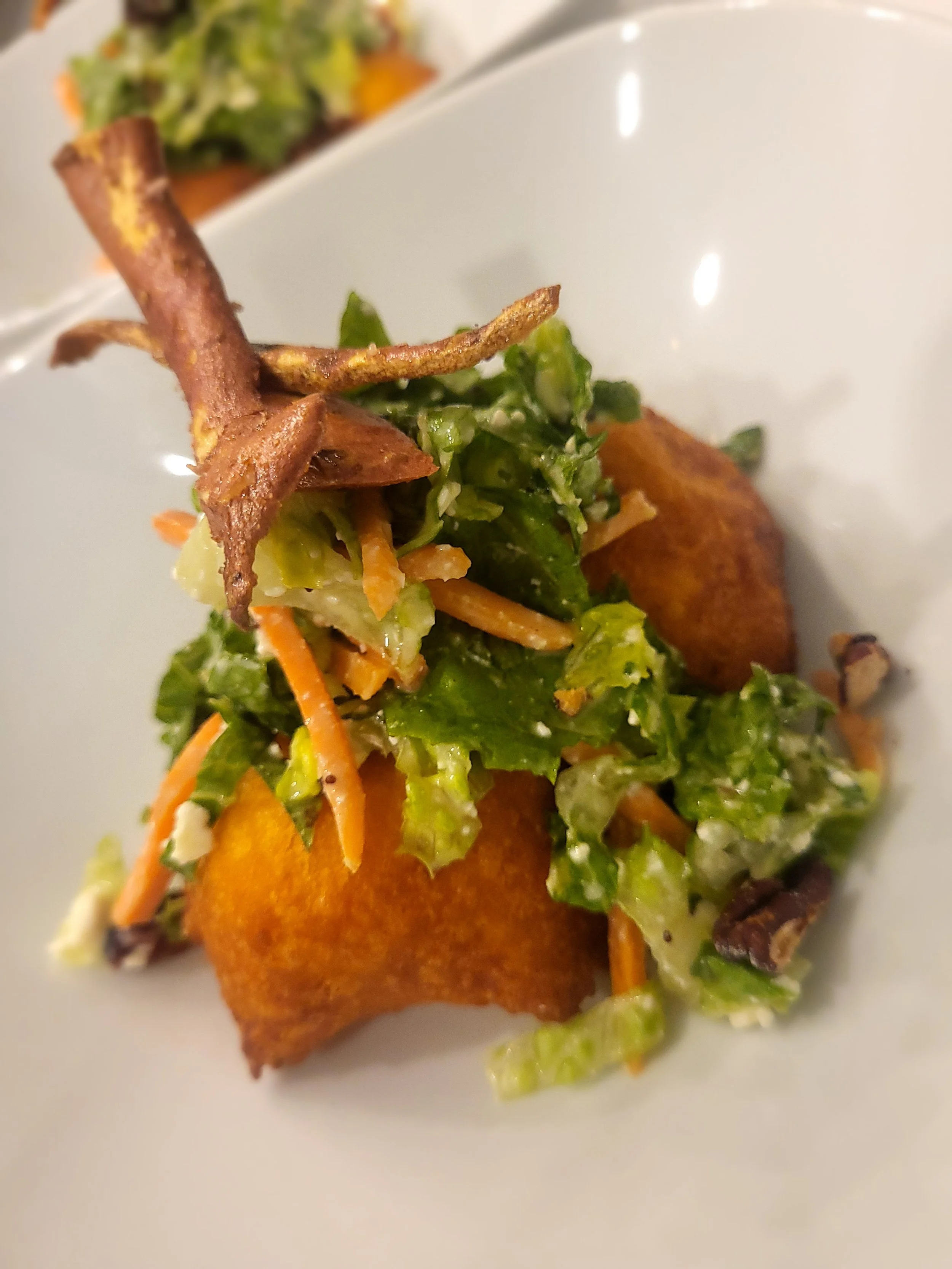 Sweet Potato fritters w/ arugula feta salad and fried sweet potato skins