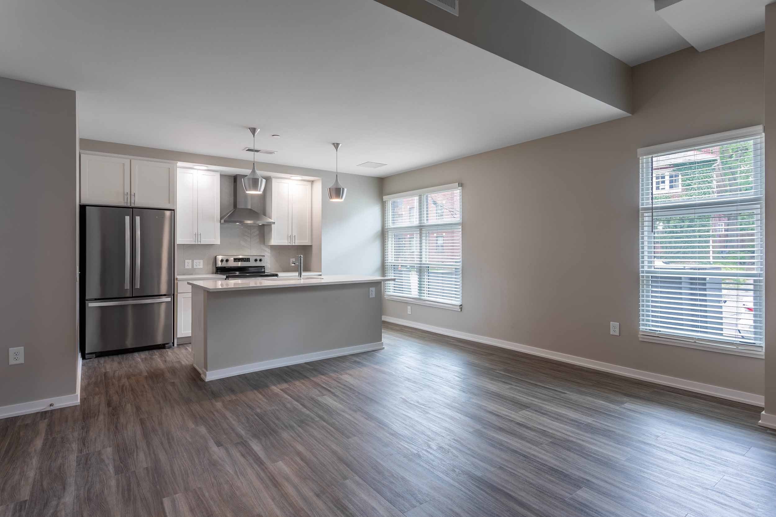 The Residences at The Sutton | Short North Apartments in Columbus, OH | Living Room and Kitchen