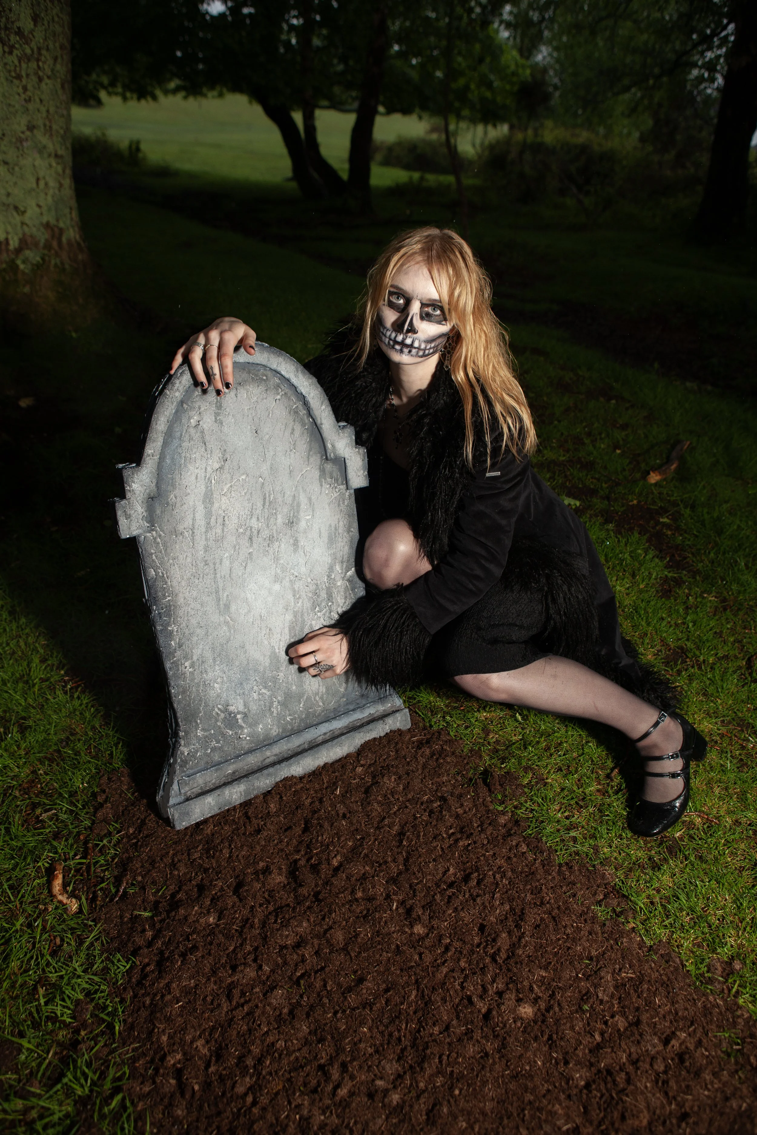 Surreal Photography including a woman in skeletal makeup around a grave