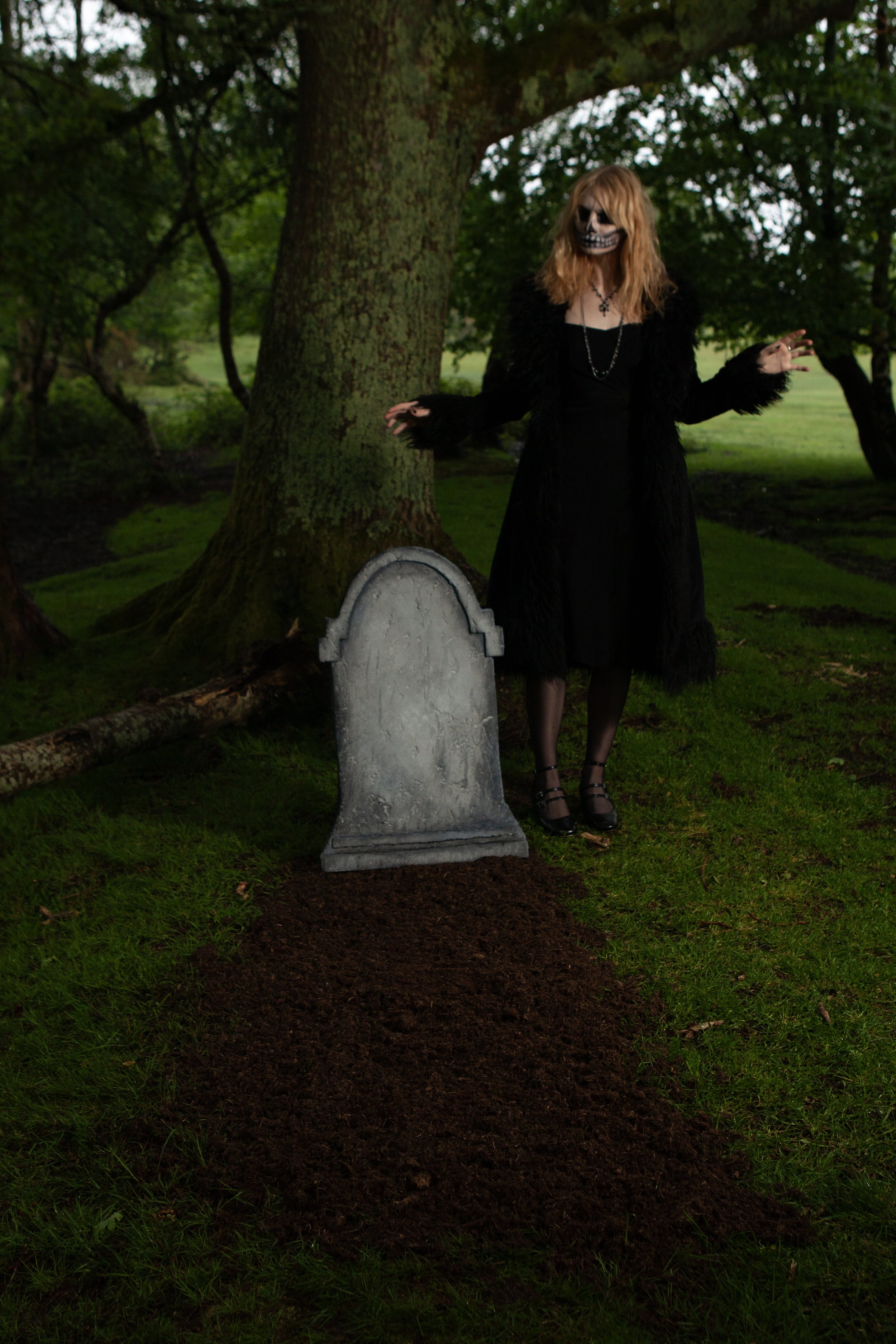 Surreal Photography including a woman in skeletal makeup around a grave