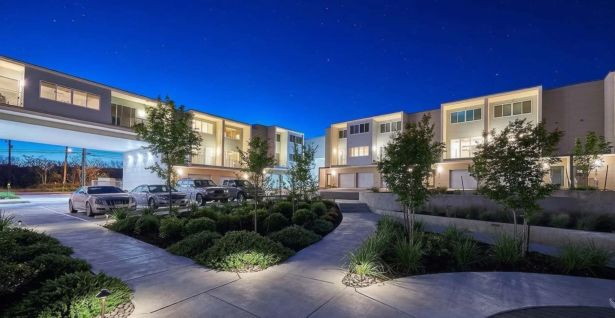 Night courtyard photo of Skybridge Lofts