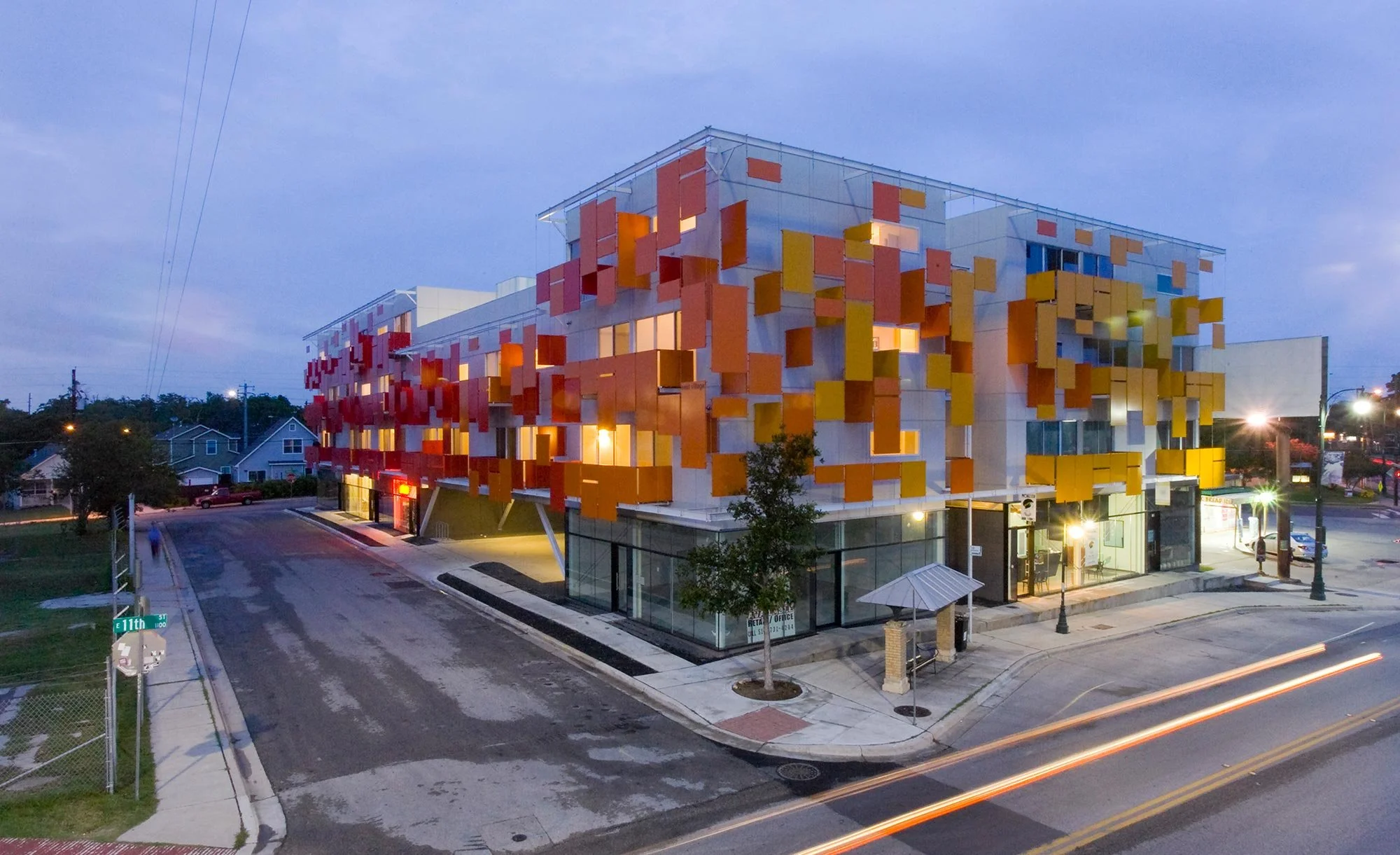 Night photo of East Village front facade