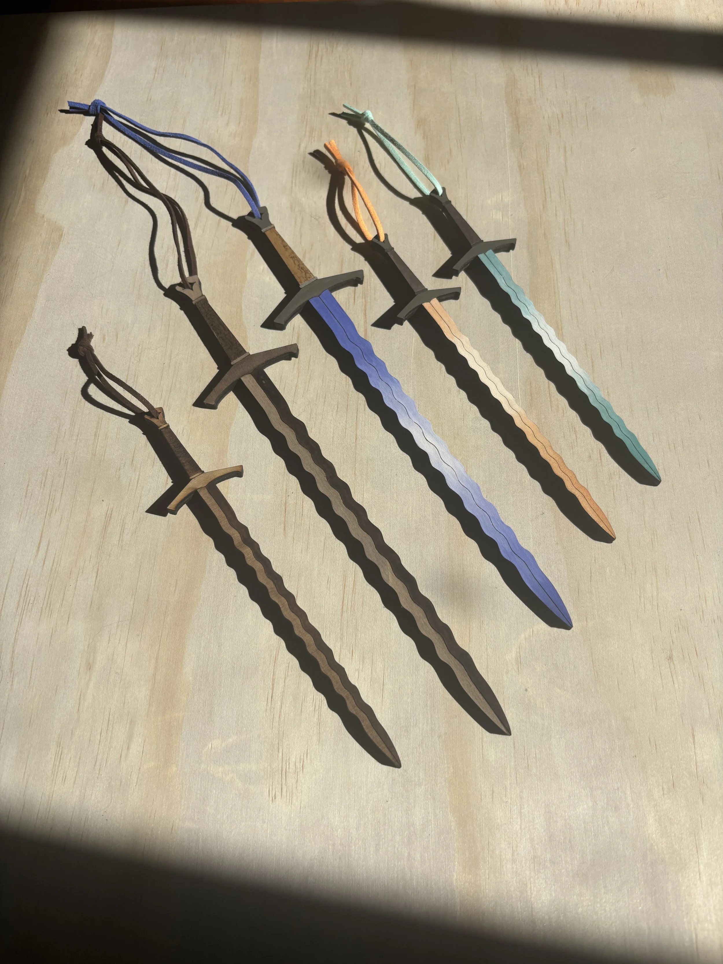 Flame-bladed Swords
4" - 6"
Combination of gouache and wood stain