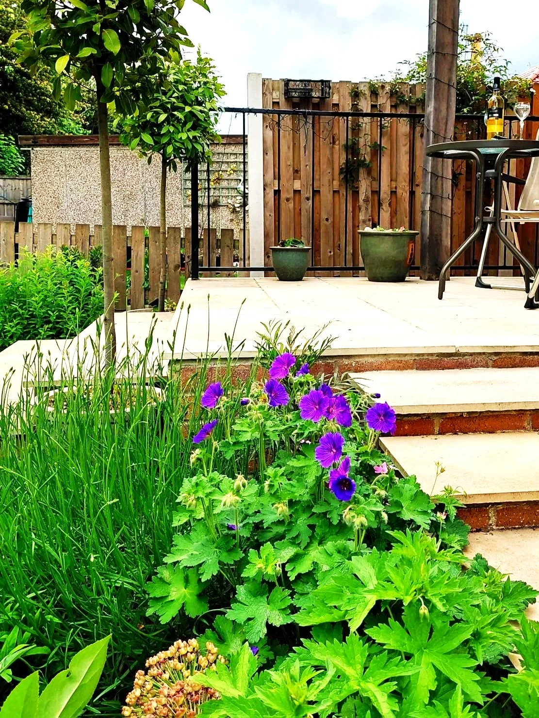 Daring to bring the wildlife and planting right up to the landscaped areas to create a strong connection with the woodlands beyond, whilst maintaining the practicalities of outdoor living and dining beyond the patio doors.