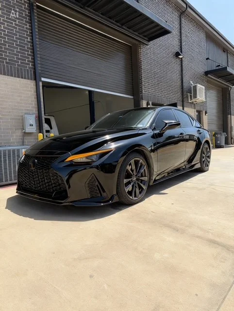 Lexus IS 350 front lip, side view mirror covers and side skirts installed. Aftermarket body kit parts. 