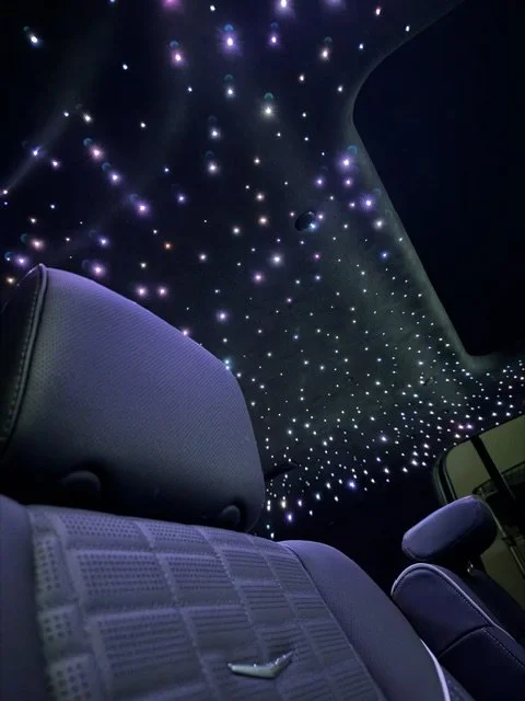 Headliner retro-fit with starlight's Cadillac Escalade. Custom lighting. 