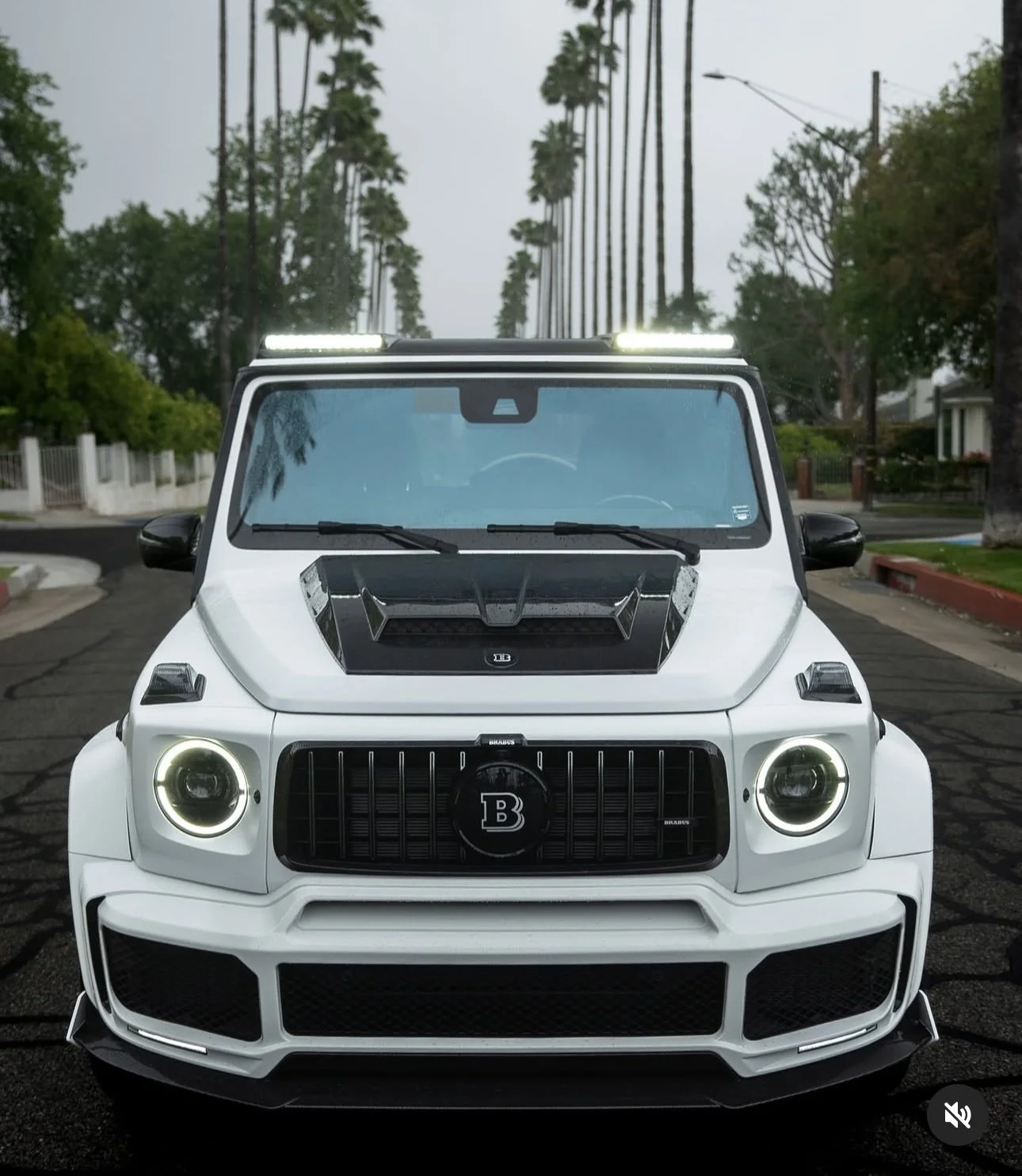 White Mercedes-AMG G63 with a Brabus front bumper and grille, built at Custom Luxury Lab in Frisco, TX