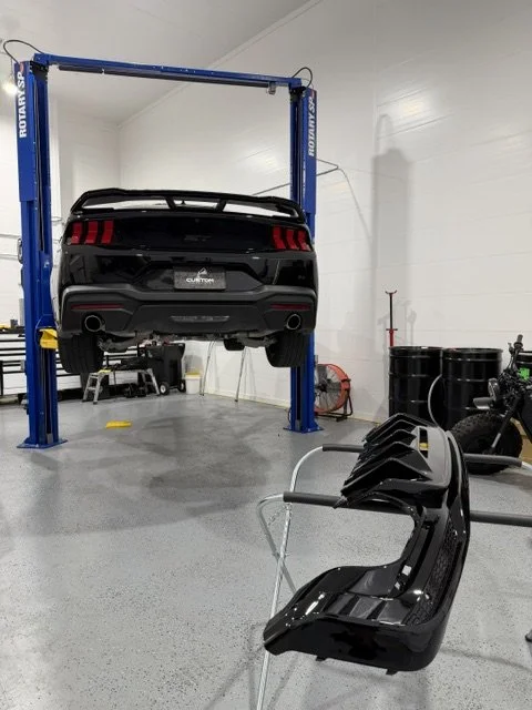 Ford Mustang GT in for a Dark Horse rear bumper diffuser upgrade. 