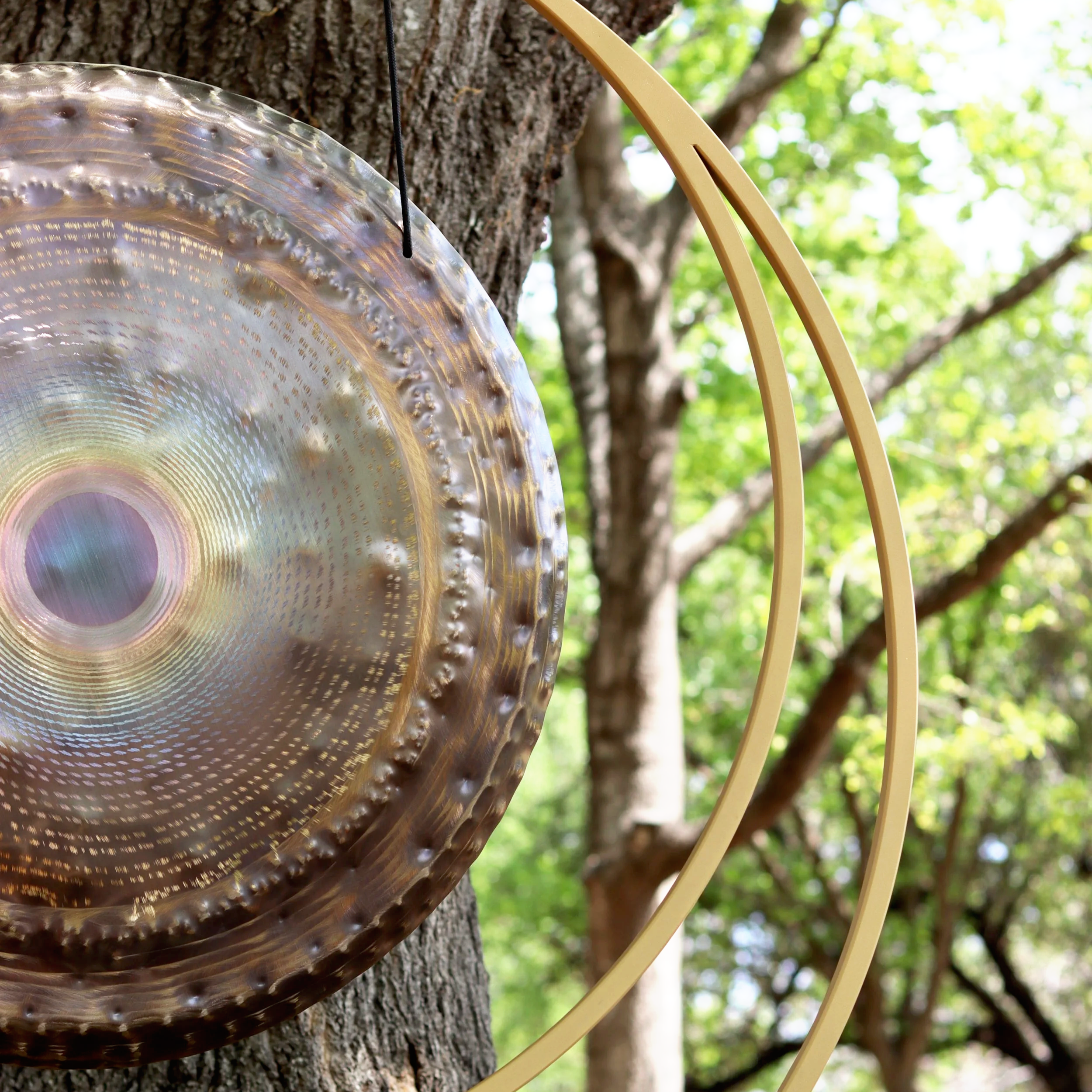 Sound bath gong used for meditation, yoga, and nervous system relaxation outdoors