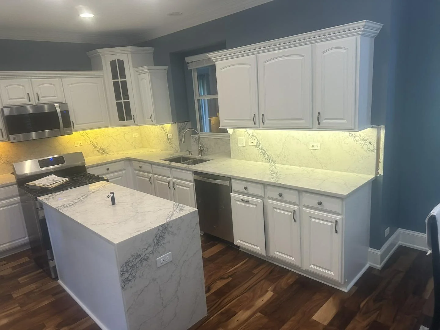 Custom quartz kitchen countertop installed by Plainfield Countertops in Plainfield with polished natural stone finish.