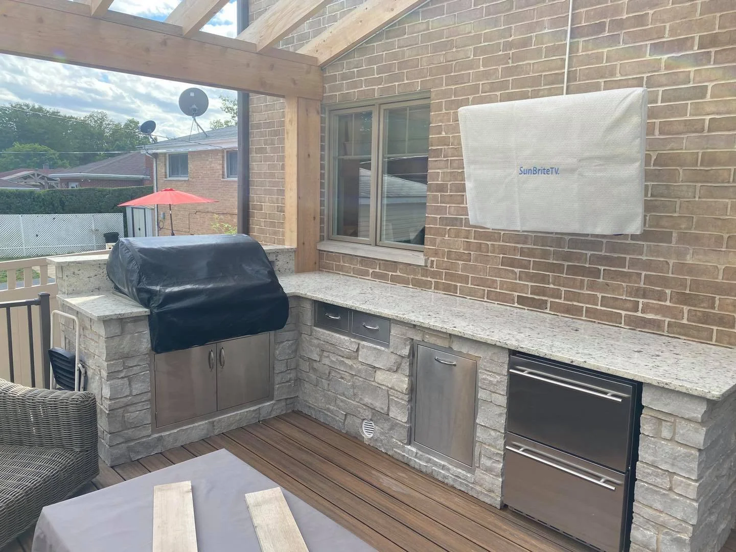 Custom marble countertops installed in an outdoor kitchen by Plainfield Countertops in Plainfield, IL, featuring durable natural stone and polished finish.
