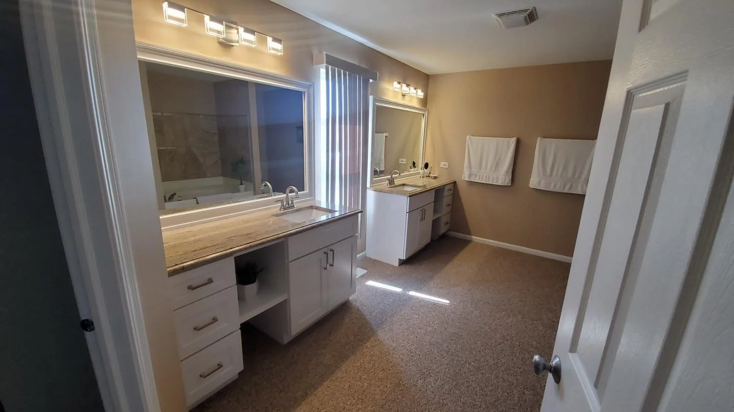 Marble and quartzite bathroom vanity countertops in Plainfield Illinois by local countertop installer