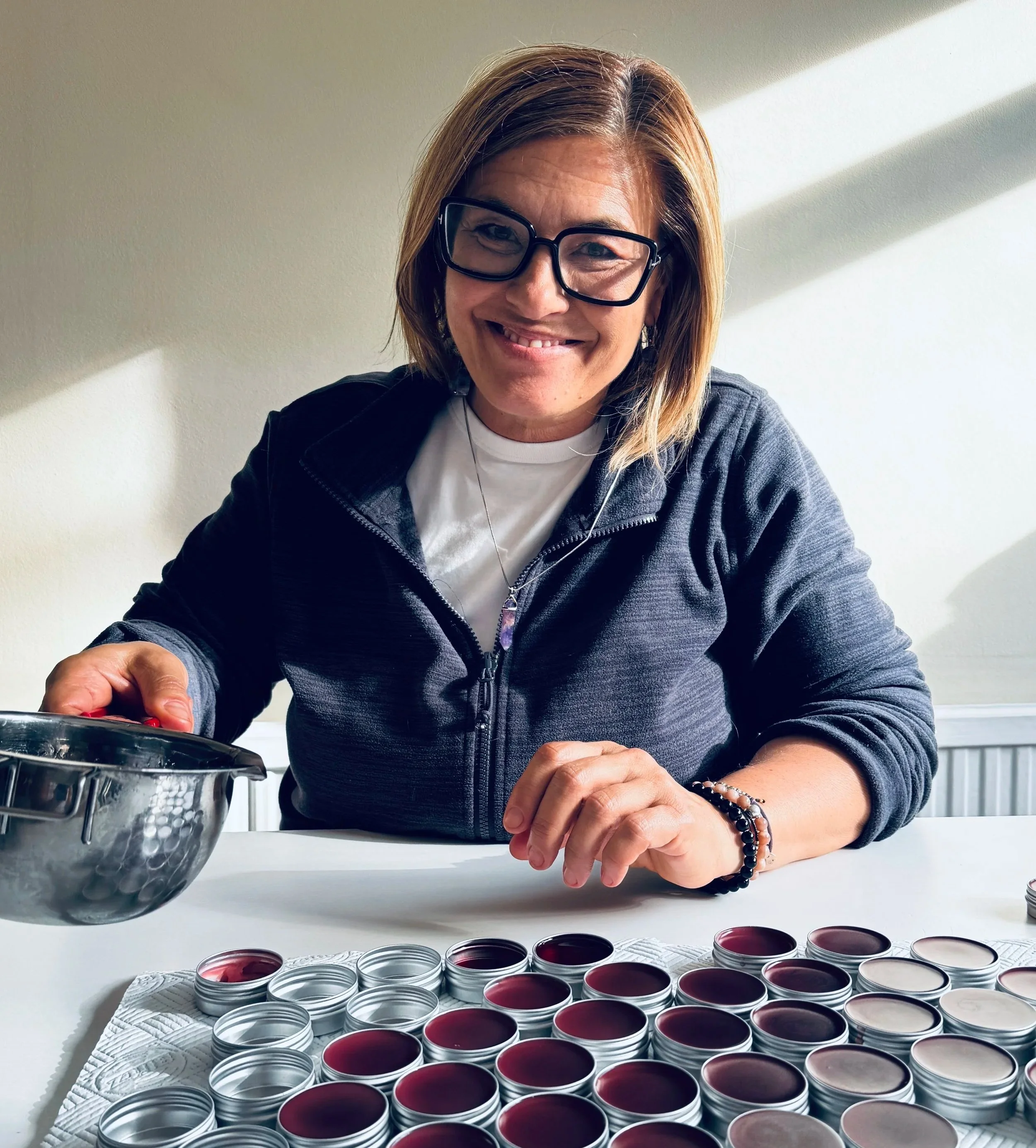 Maria Sole Dal Re handcrafting botanical skincare formulations for Shenming Botanicals in Richmond, London.