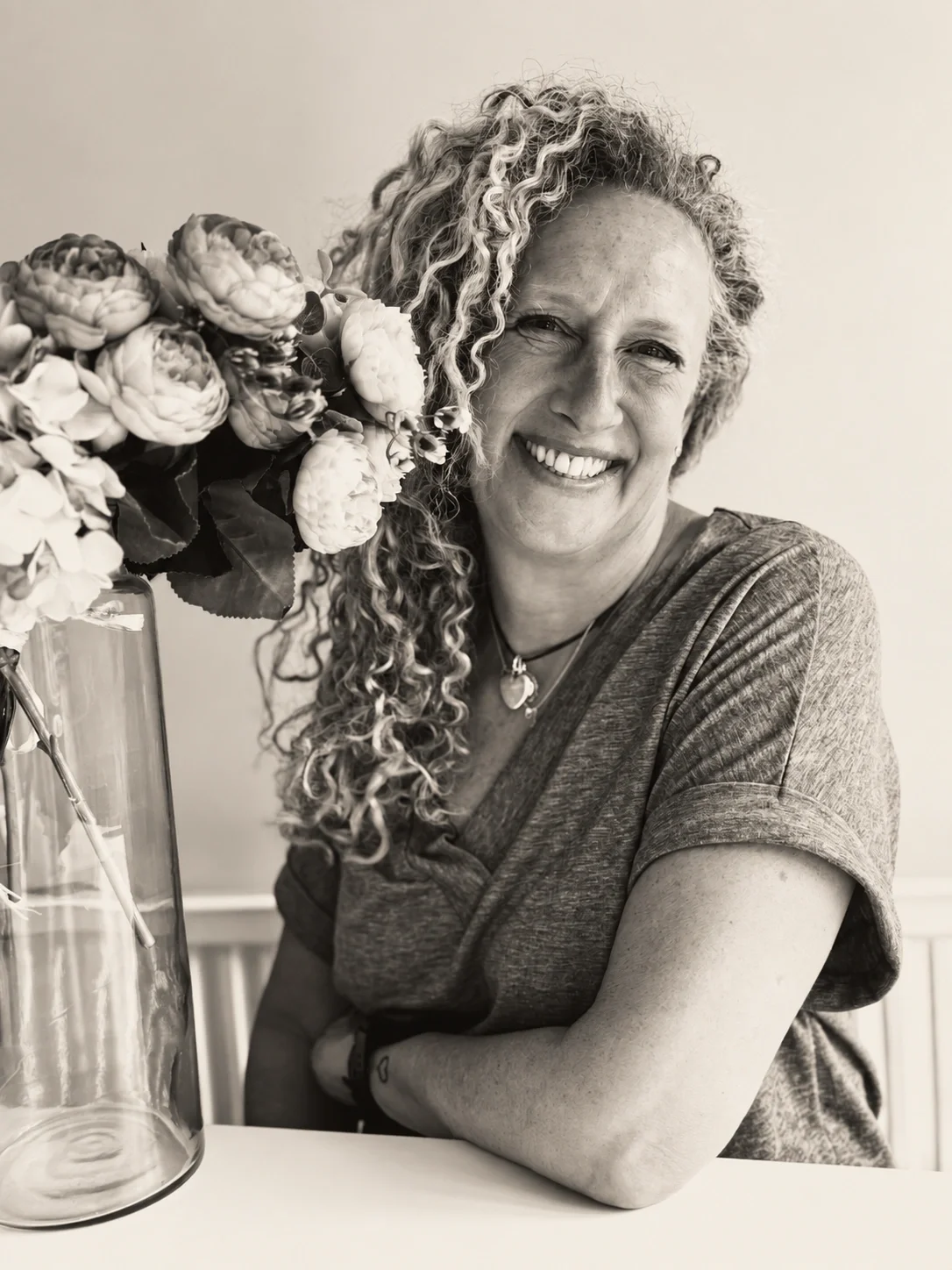 woman smiling while thinking about Shenming Botanicals products