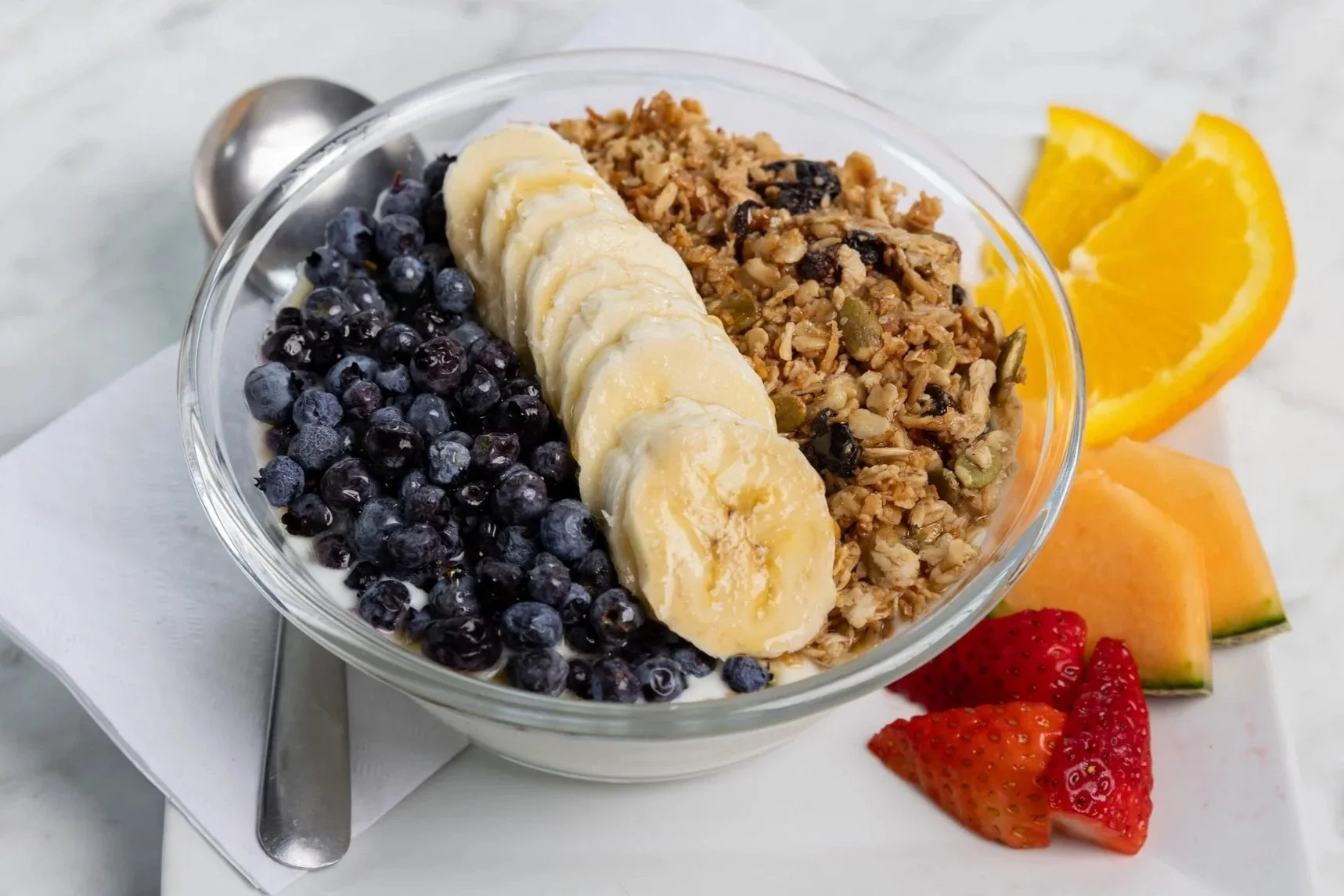 Yogurt and granola bowl with bananas and blueberries At Fancy Pants Cafe in Bridgewater, Nova Scotia
