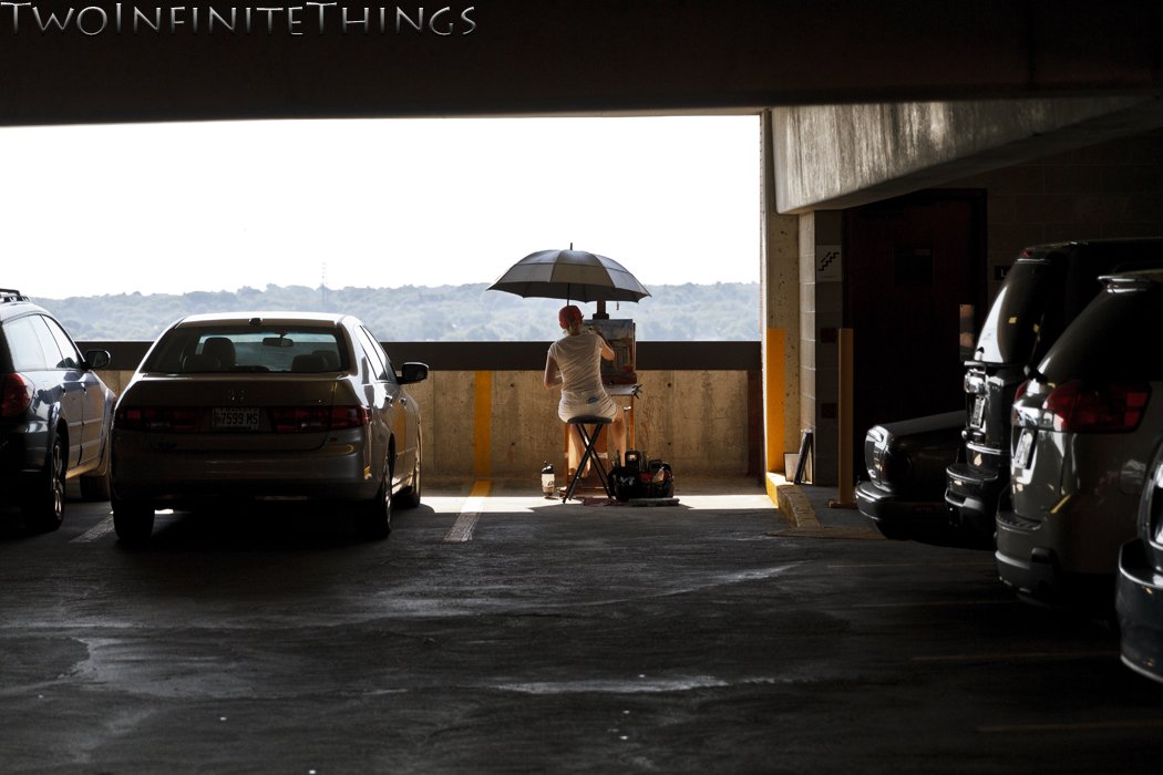 Erin McGee Ferrell painting from a parking garage, 2014. Photograph: TwoInfiniteThings.