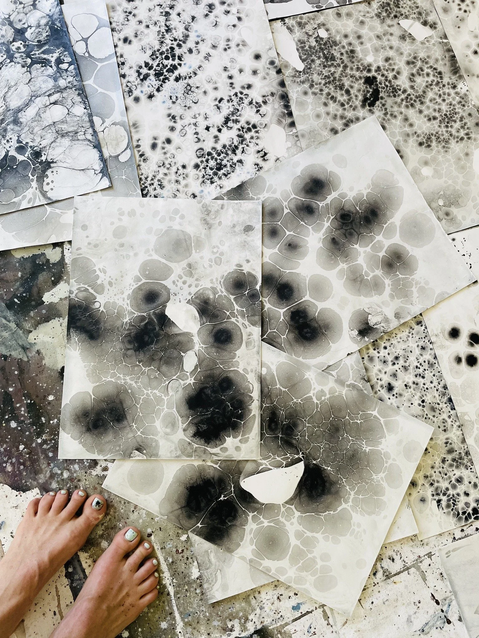 Studio view · Marbled paper and materials