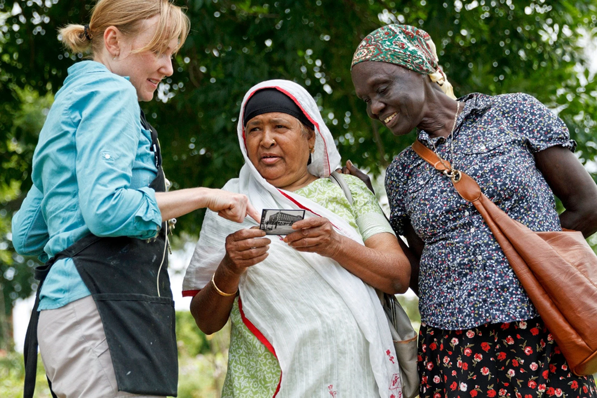 Erin McGee Ferrell with community members during Across Franklin, the Whole Foods Market-sponsored urban garden project in Portland, Maine.