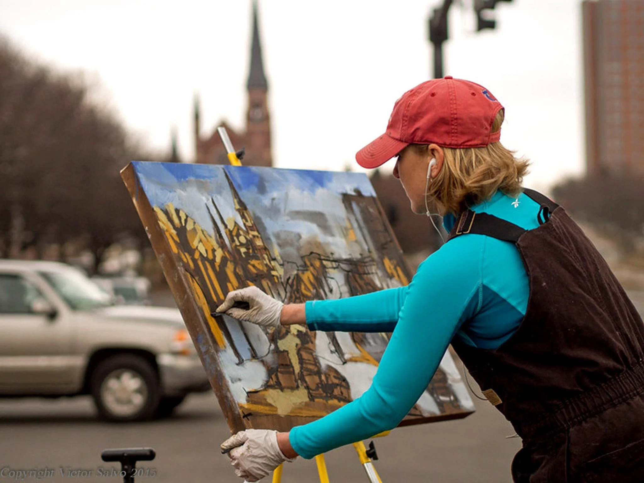 Erin McGee Ferrell painting on location in Portland, Maine, 2015. Photograph © Victor Salvo.