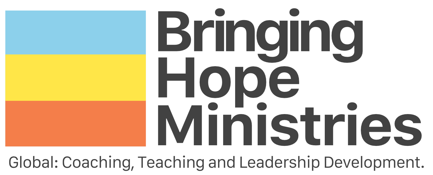 Bringing Hope Ministries logo with stacked colored squares in blue, yellow, orange, and black, alongside the text 'Bringing Hope Ministries' and the tagline 'Global: Coaching, Teaching and Leadership Development.'