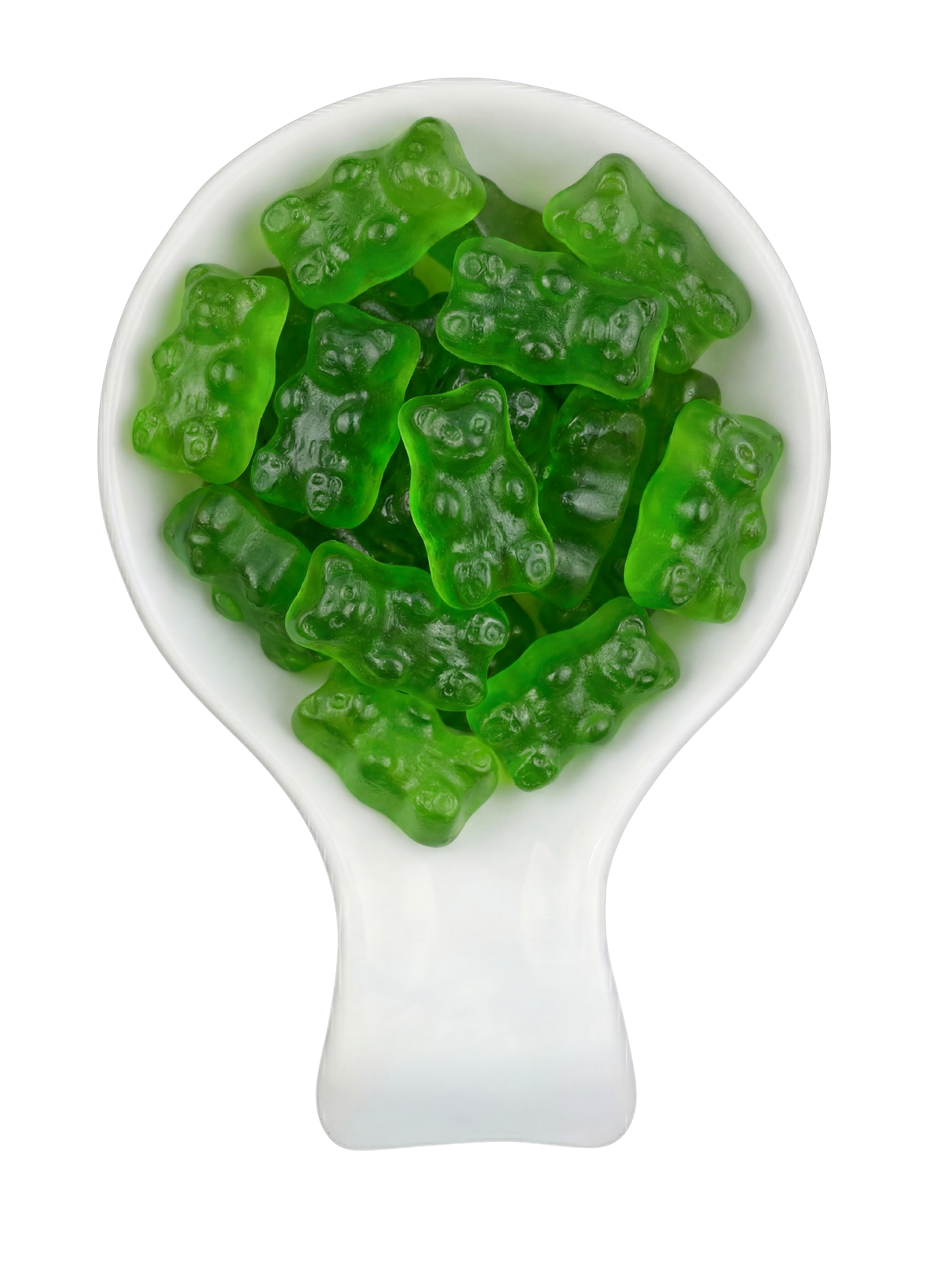 Green gummy bears in a white spoon on a black background.