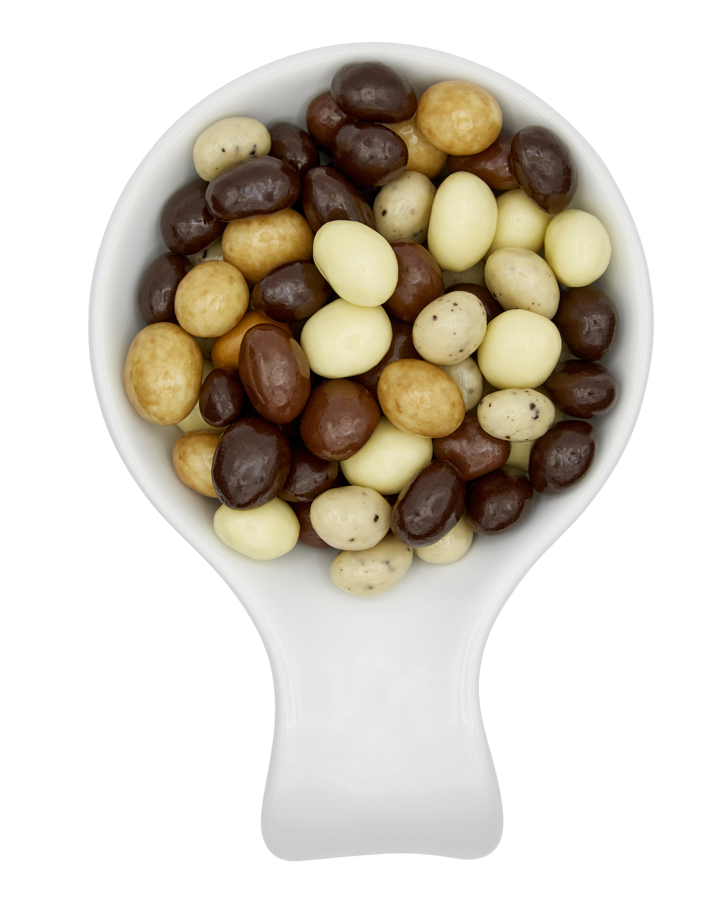 Mixed colorful chocolate and yogurt-covered peanuts in a white scoop-shaped bowl