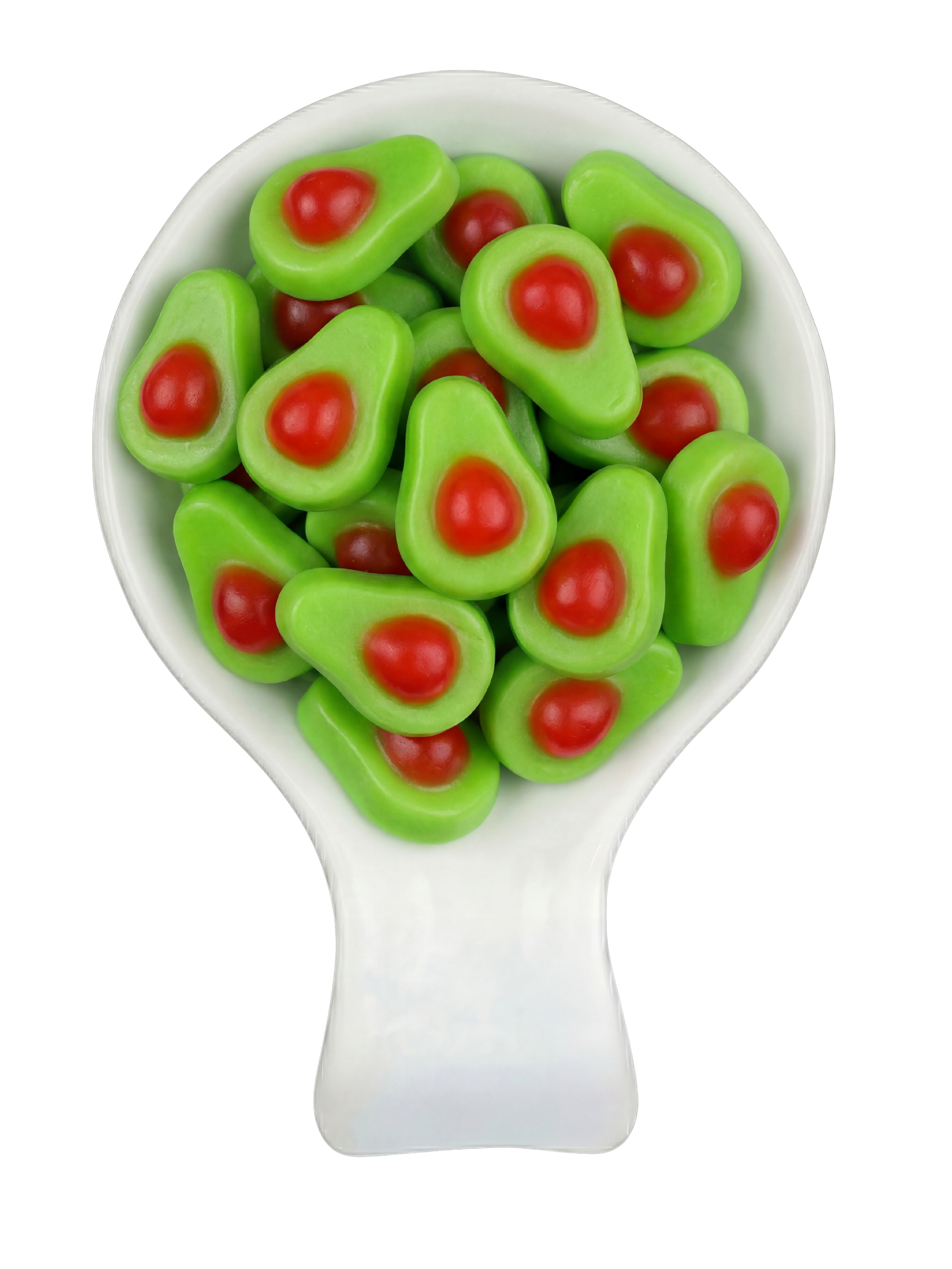 A spoonful of gummy candies shaped like avocados with green outer layer and red center, set against a black background.