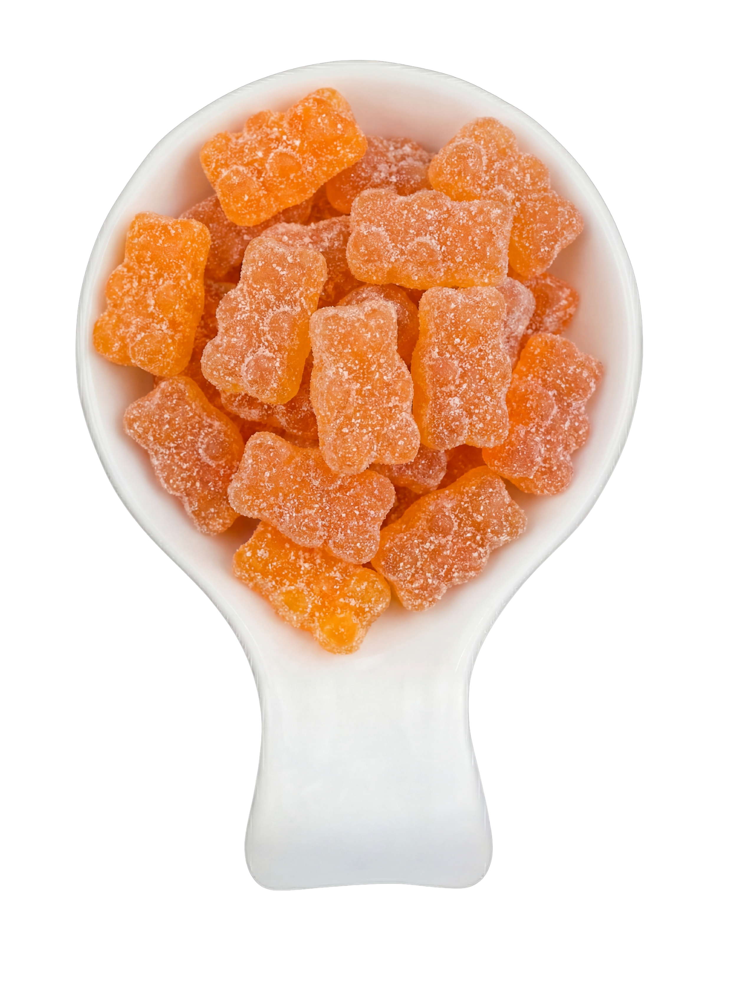 Close-up of a white ceramic spoon filled with orange gummy bear candies covered in sugar crystals, set against a black background.