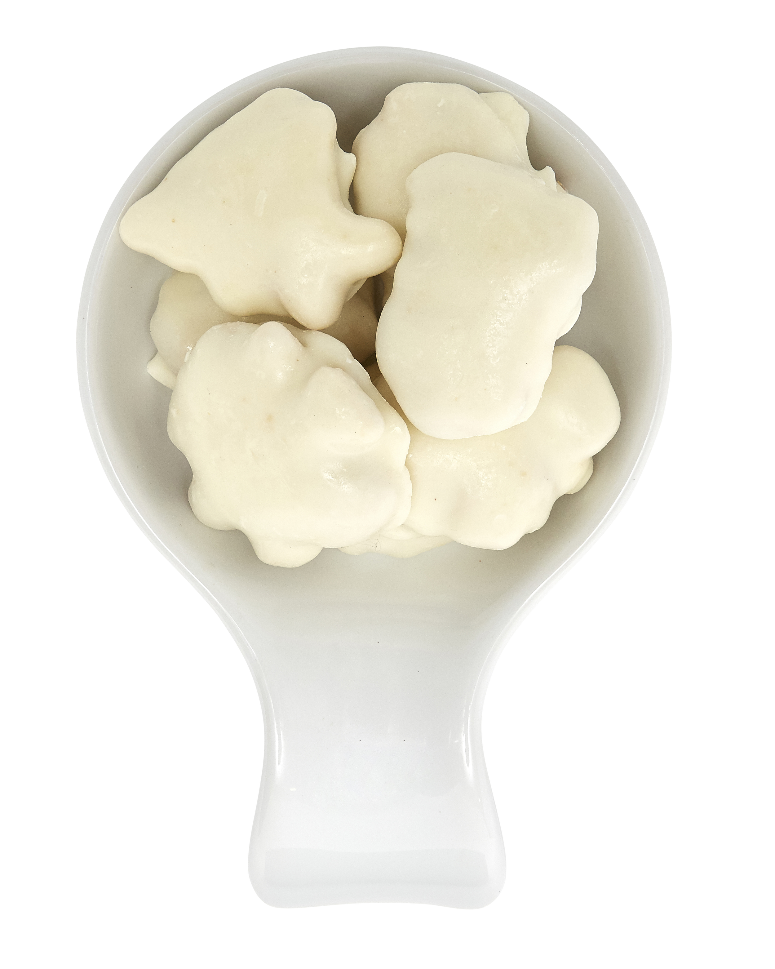 Close-up of vanilla ice cream in a white spoon.