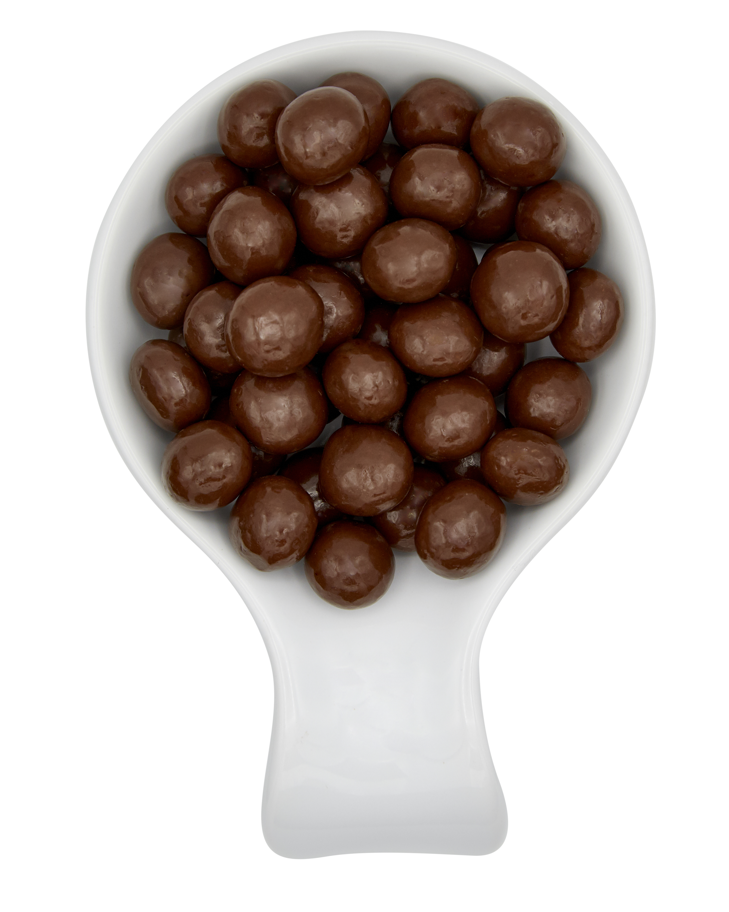 A scoop filled with round chocolate candies, placed against a black and white background.