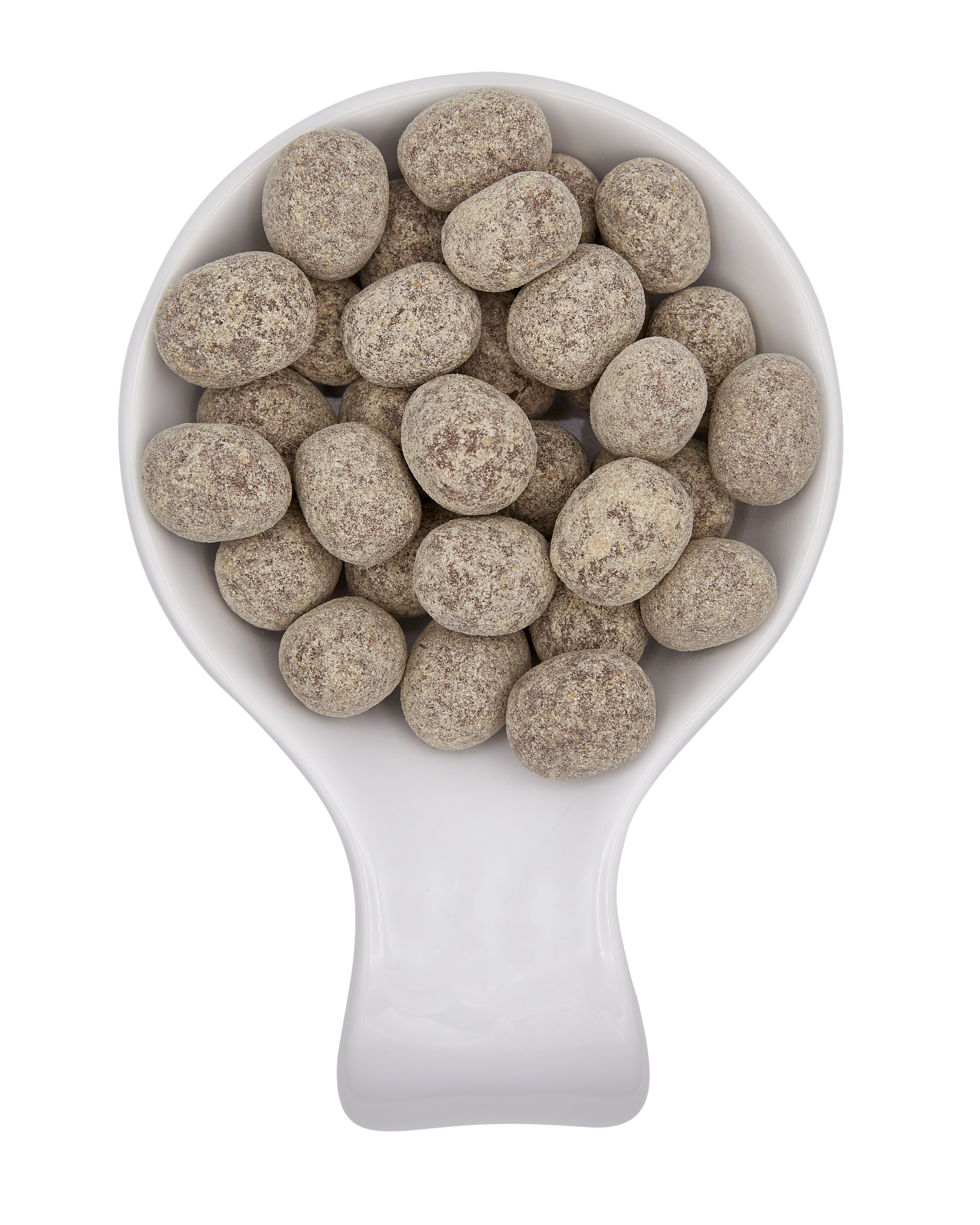 A scoop filled with small round chocolate-covered snacks or candies.