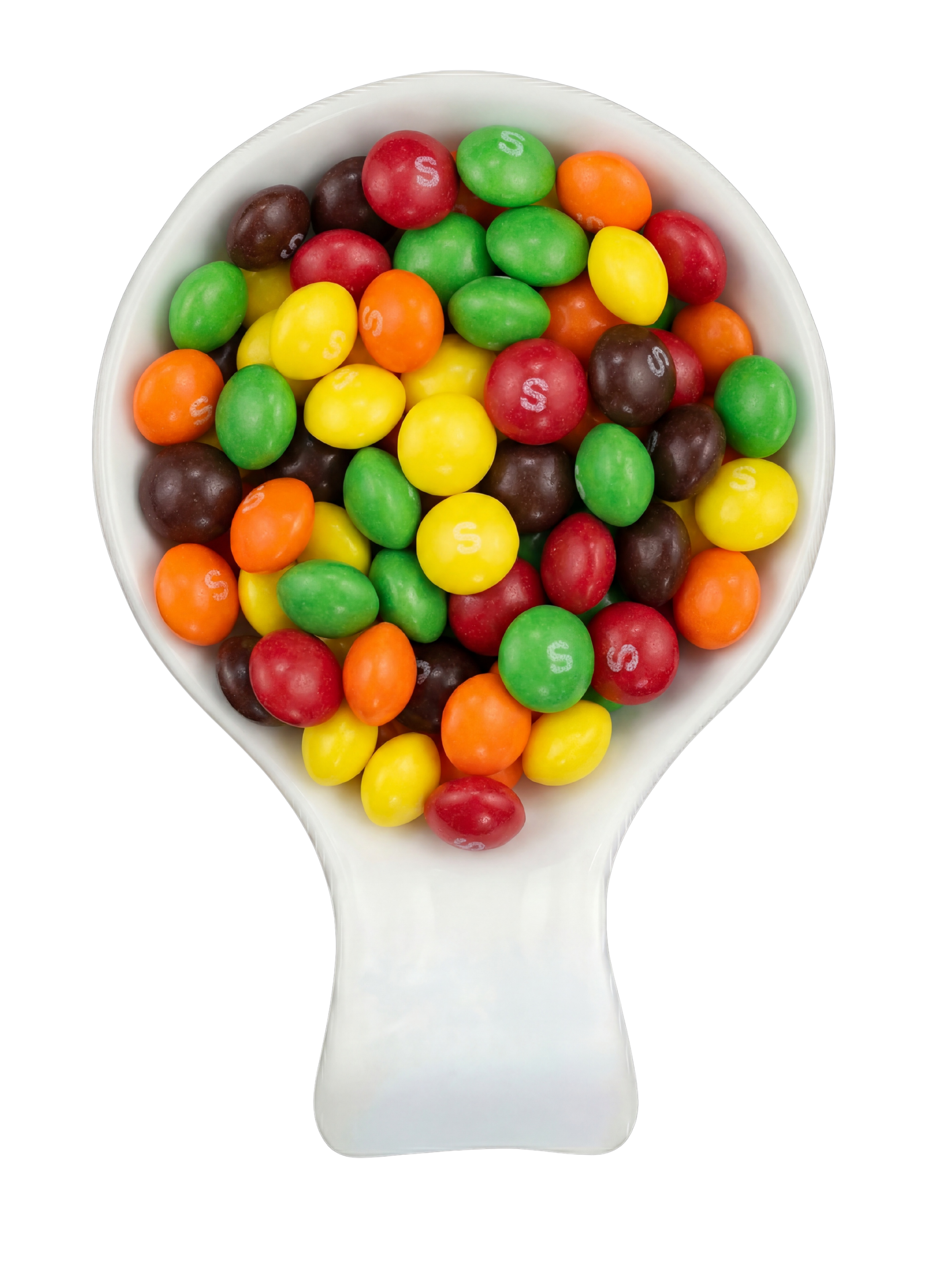 A white spoon filled with colorful Skittles candies in various colors including red, green, yellow, orange, and brown, with some candies marked with the letter 'S'.