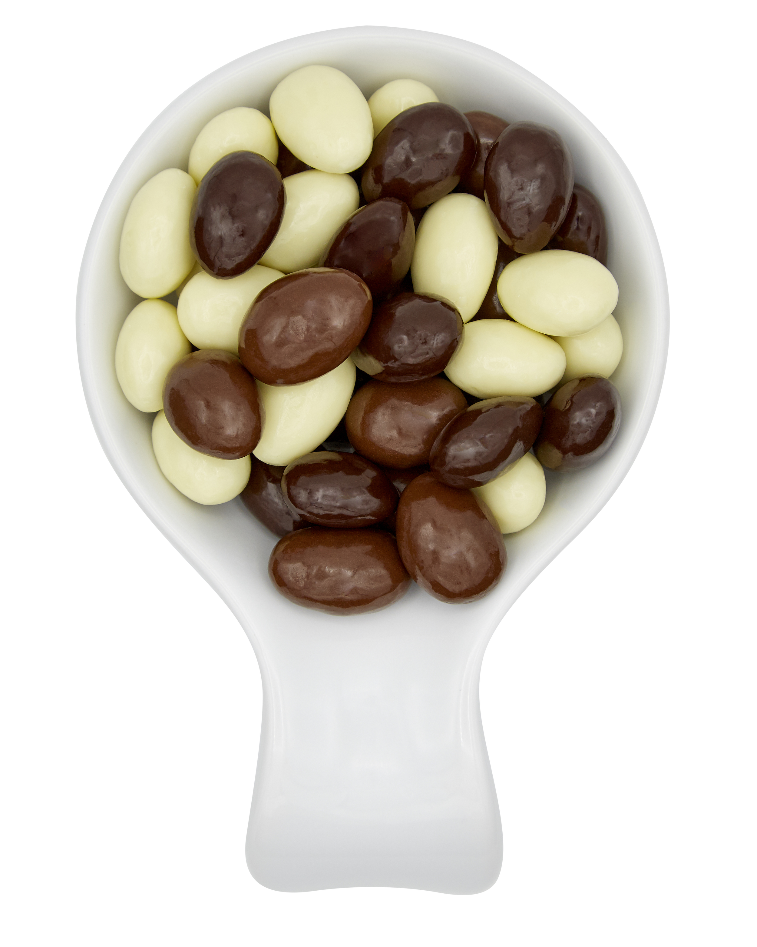 A white bowl filled with white and dark brown coated jelly beans.
