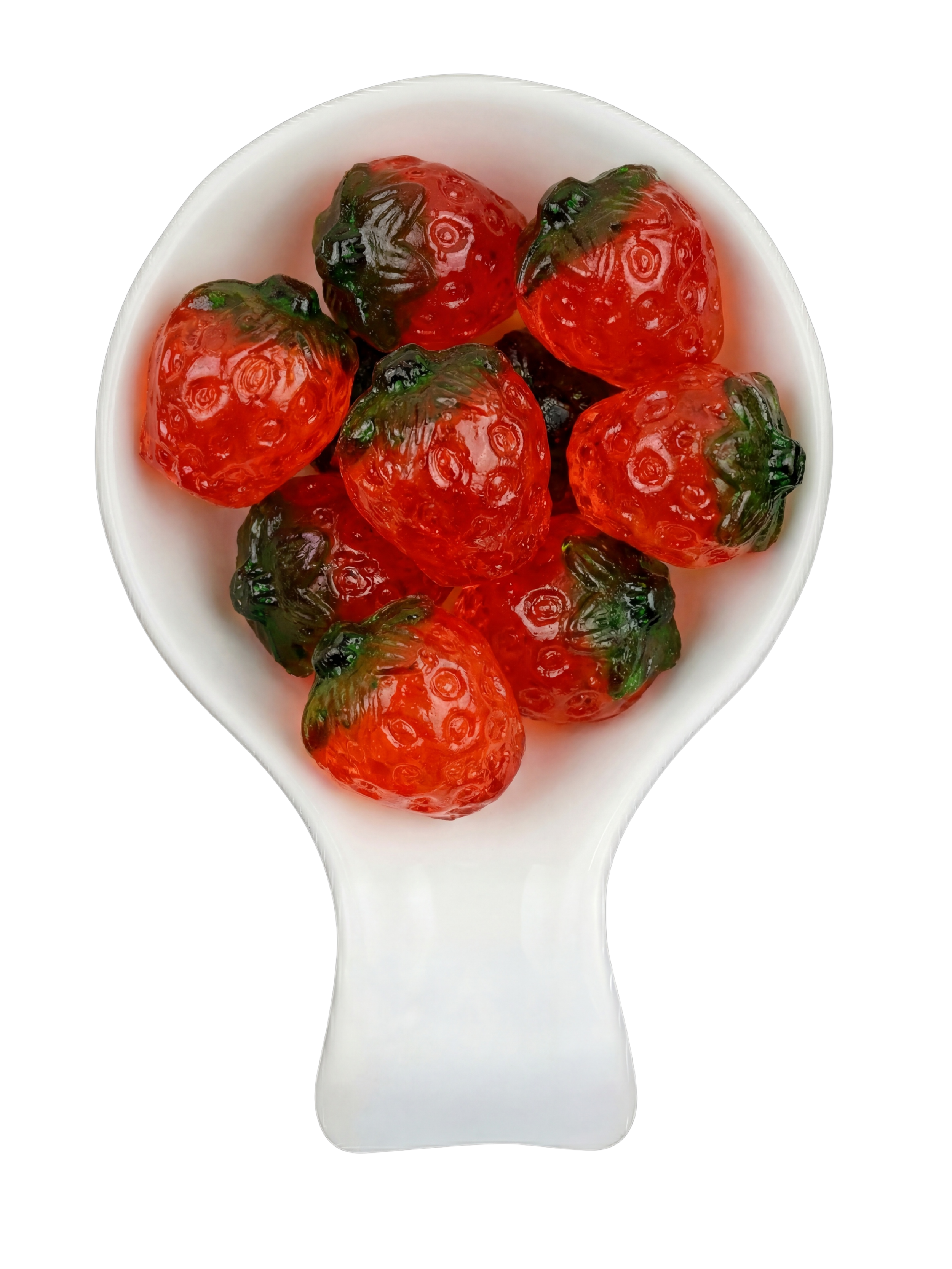 Close-up of a white spoon filled with fresh strawberries with green leaves attached, set against a black background.