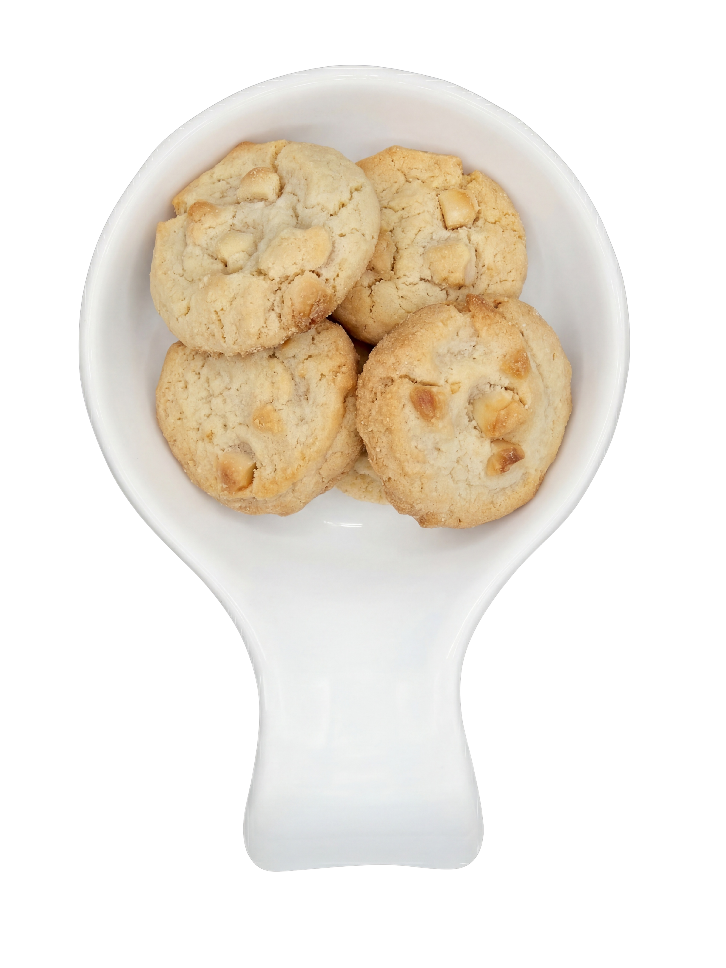 Close-up of a white ceramic spoon filled with four homemade cookies with white chocolate chunks, against a black background.