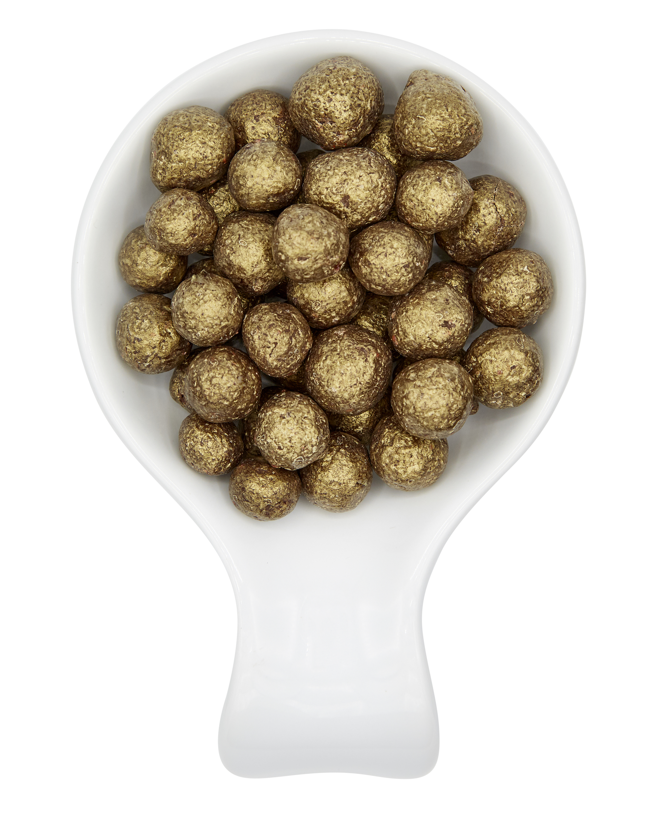 A white scoop filled with small, round, gold-colored edible balls.