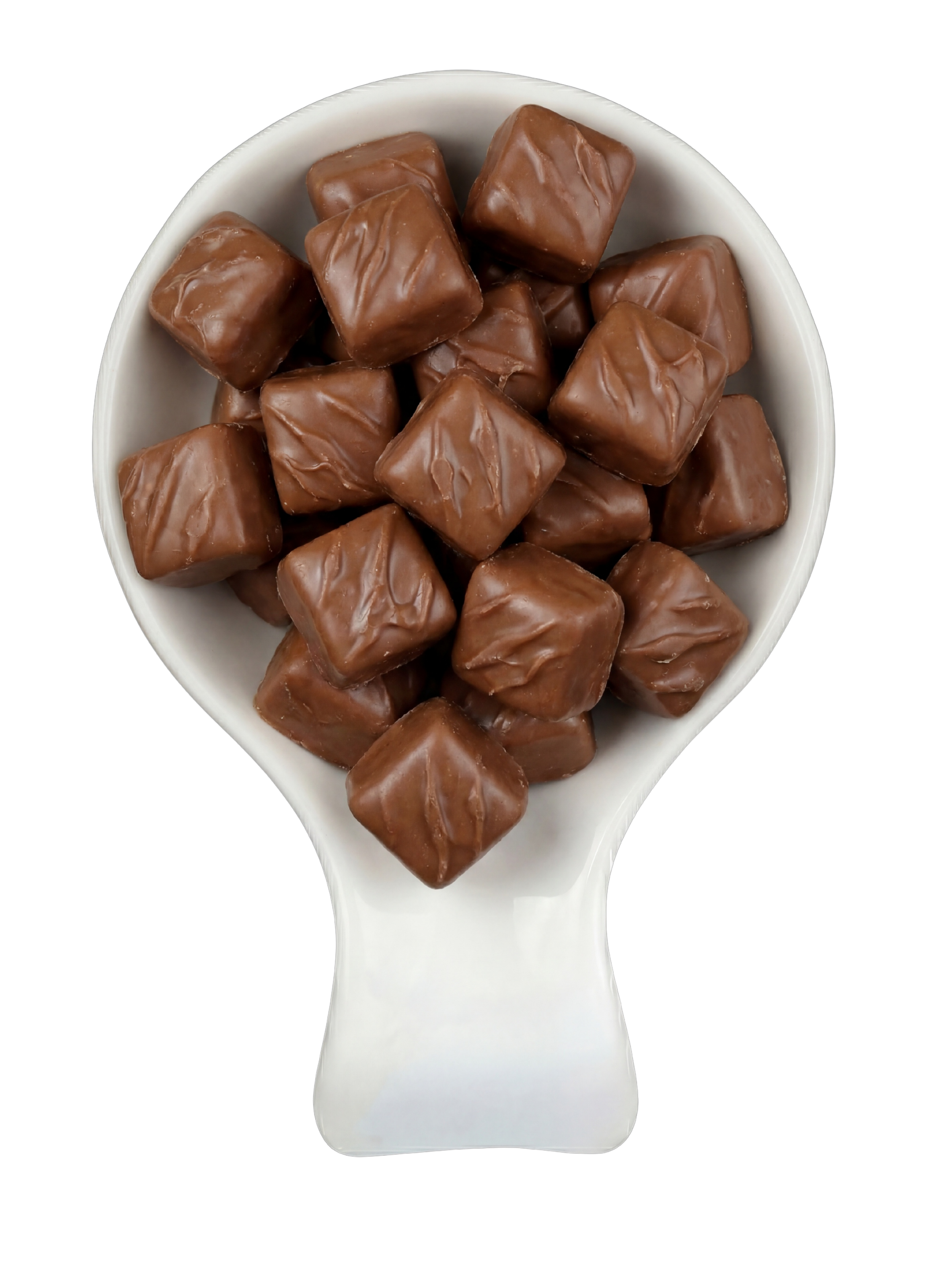 A white spoon filled with small square-shaped chocolate candies coated with a glossy chocolate shell against a black background.