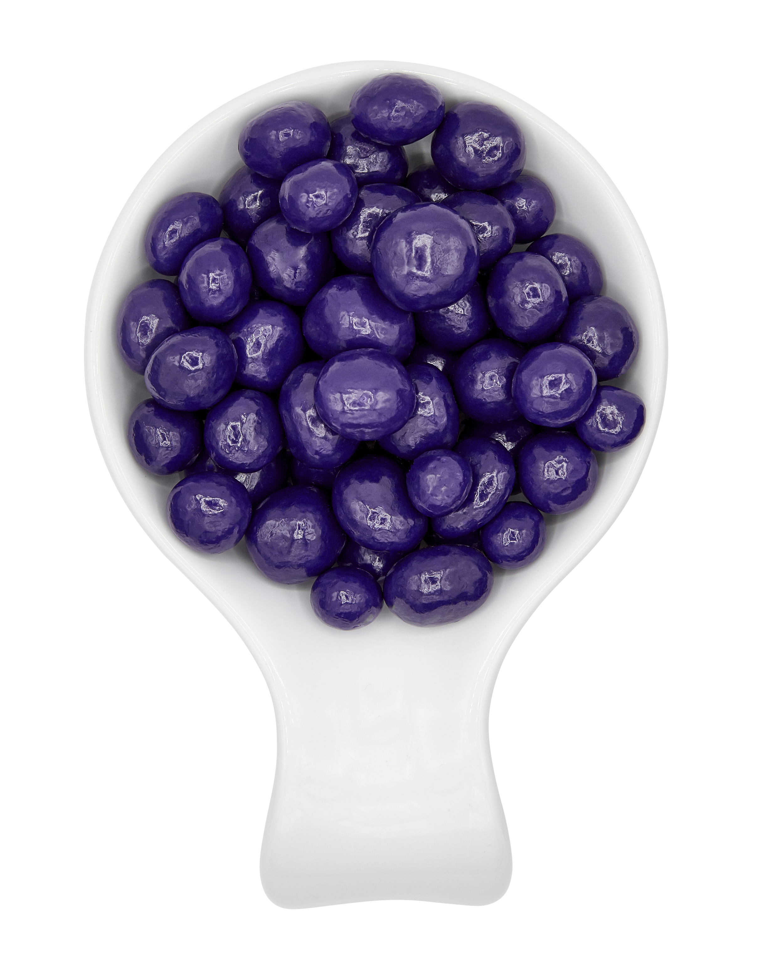 Purple blueberries in a white scoop against a black and white background.