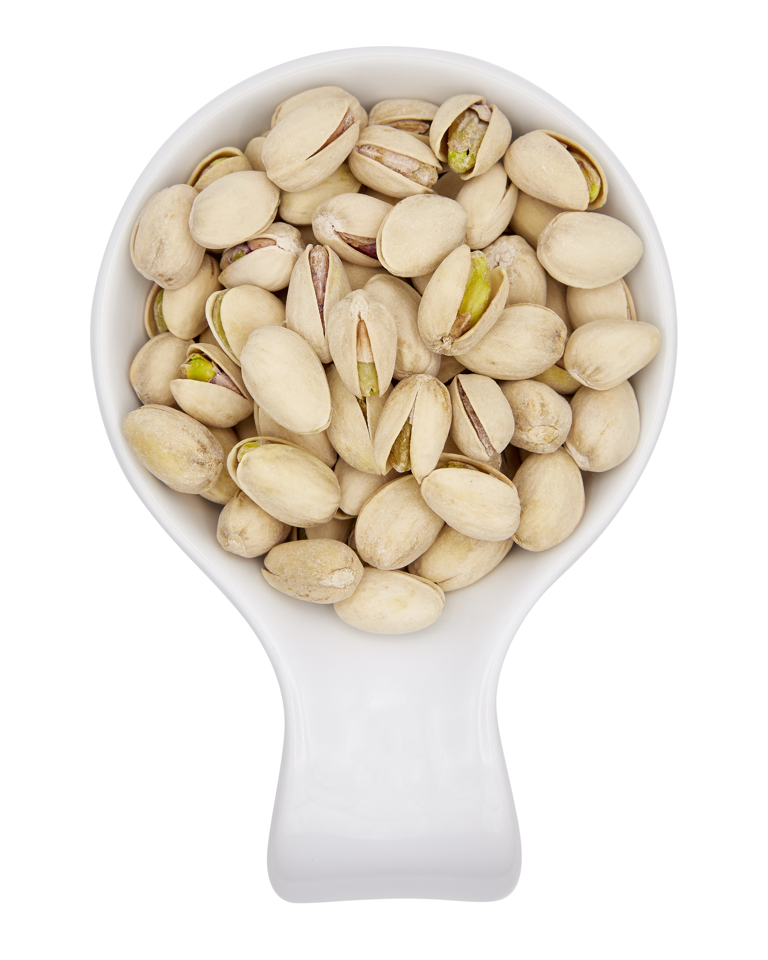 Pistachios in a white bowl.