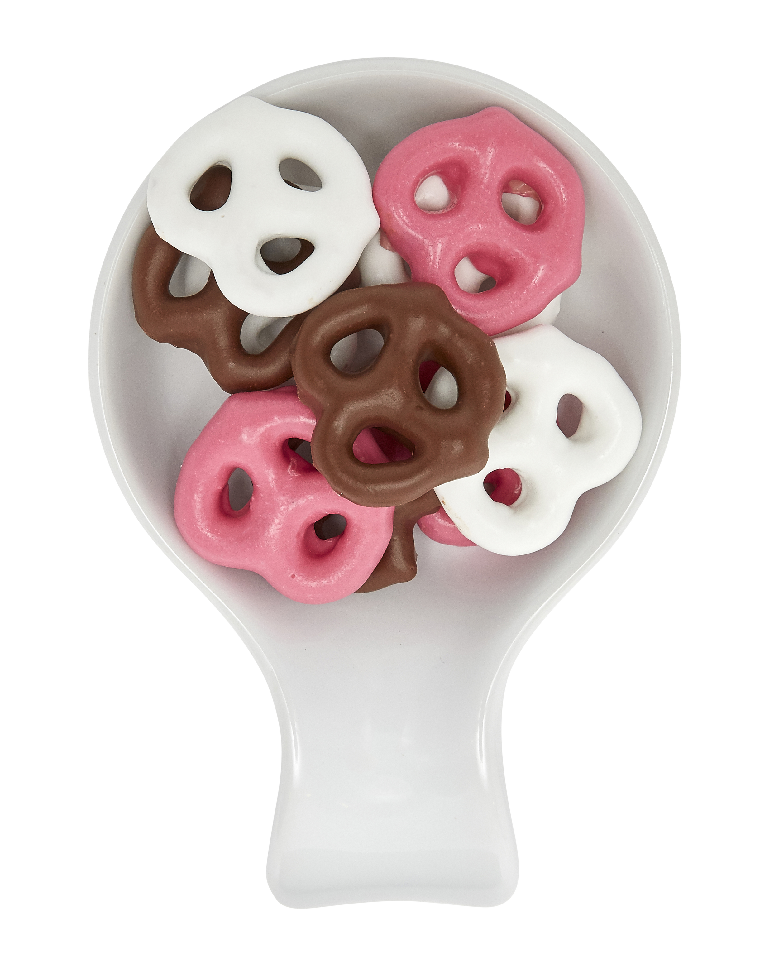 Assorted sugar pretzels in pink, white, and brown on a white spoon.
