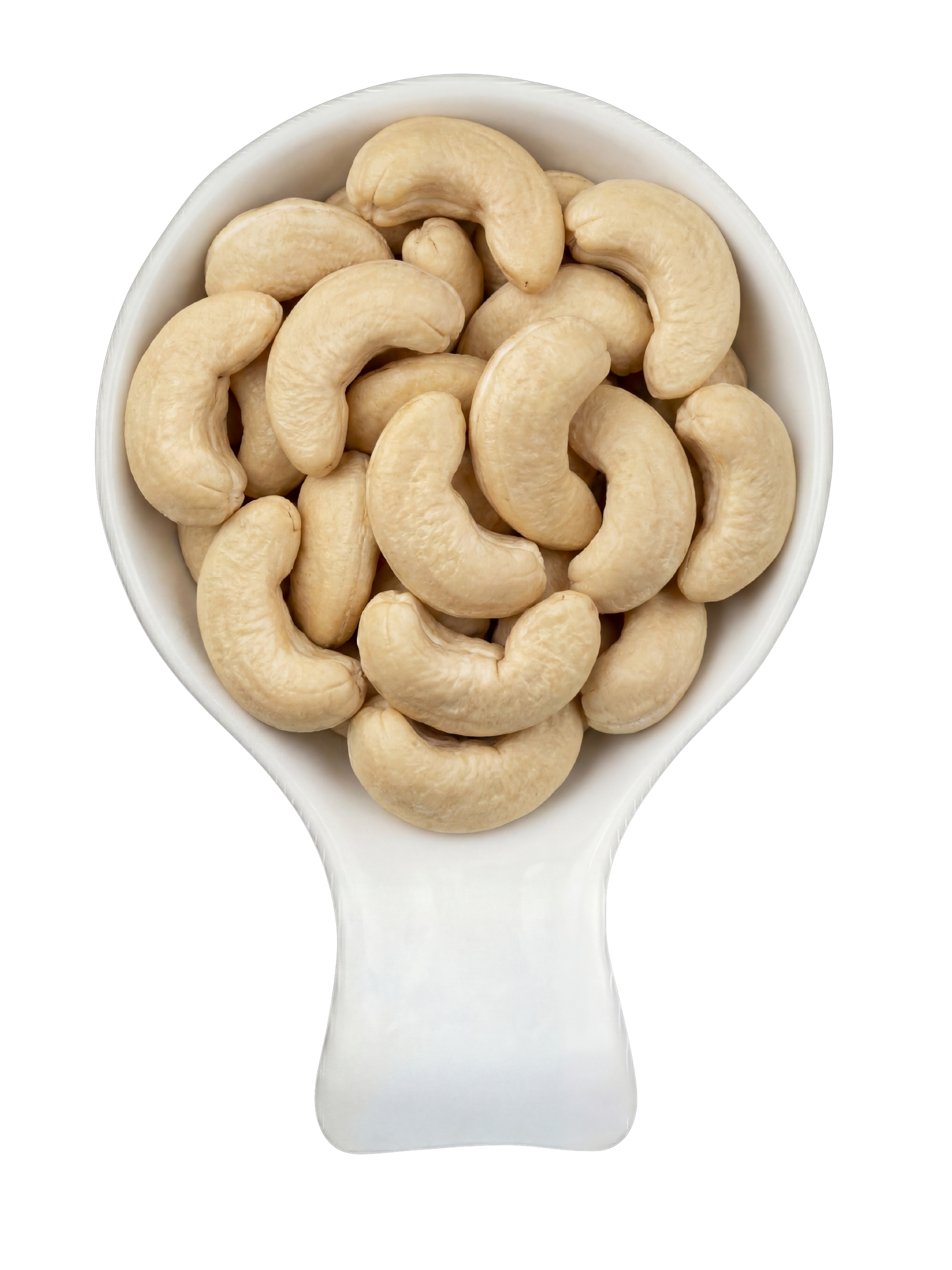 A white ceramic spoon filled with raw cashew nuts on a black background.